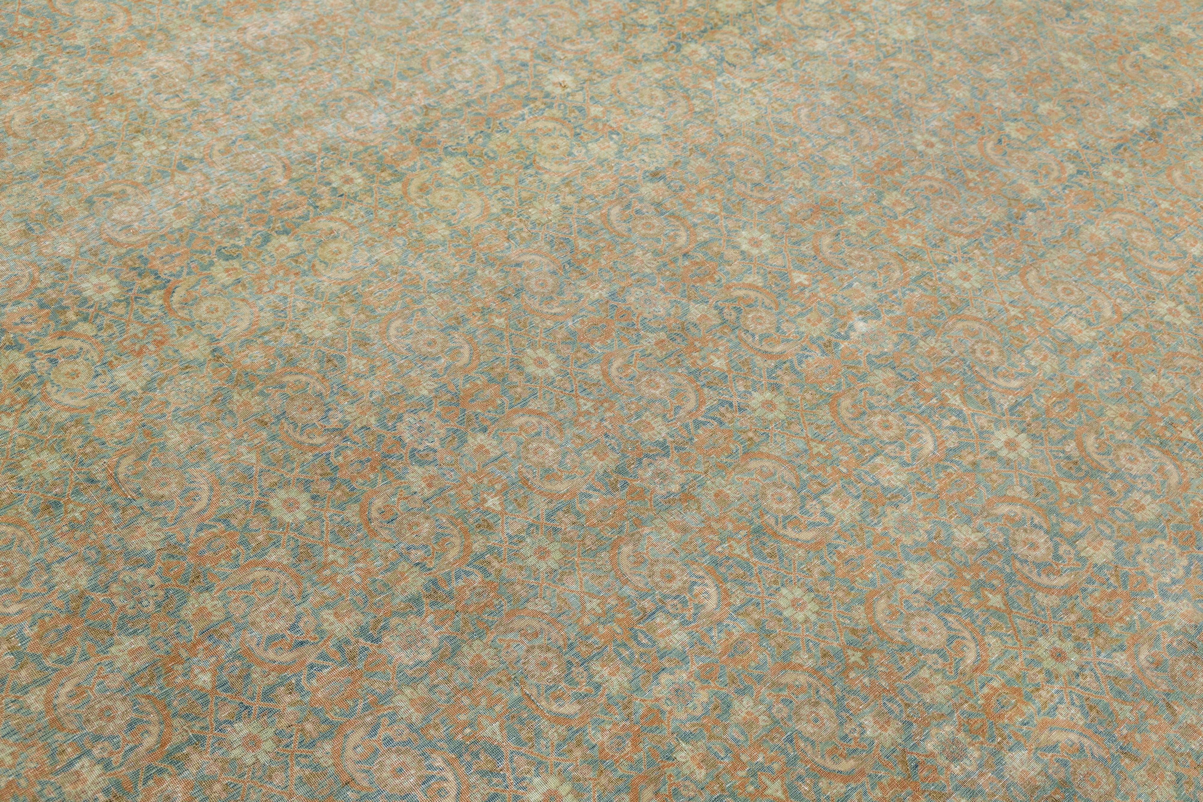 Allover entworfen antike persische Tabriz Wolle Teppich handgefertigt in blau aus den 1900er Jahren im Angebot 1