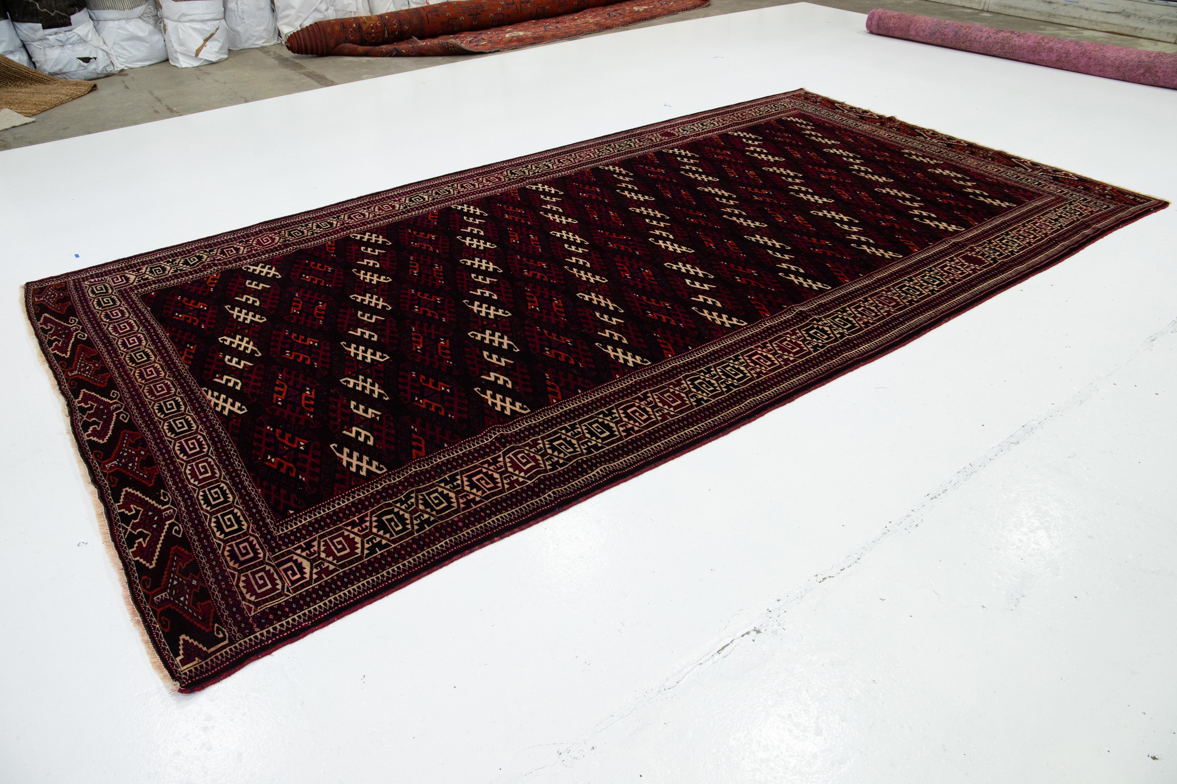 Allover Designed Handmade Afghan Wool Rug From 1930s In Burgundy Color In Excellent Condition For Sale In Norwalk, CT