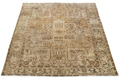 Allover Designed Persian Heriz Antique Wool Rug In light Brown From The 1920s