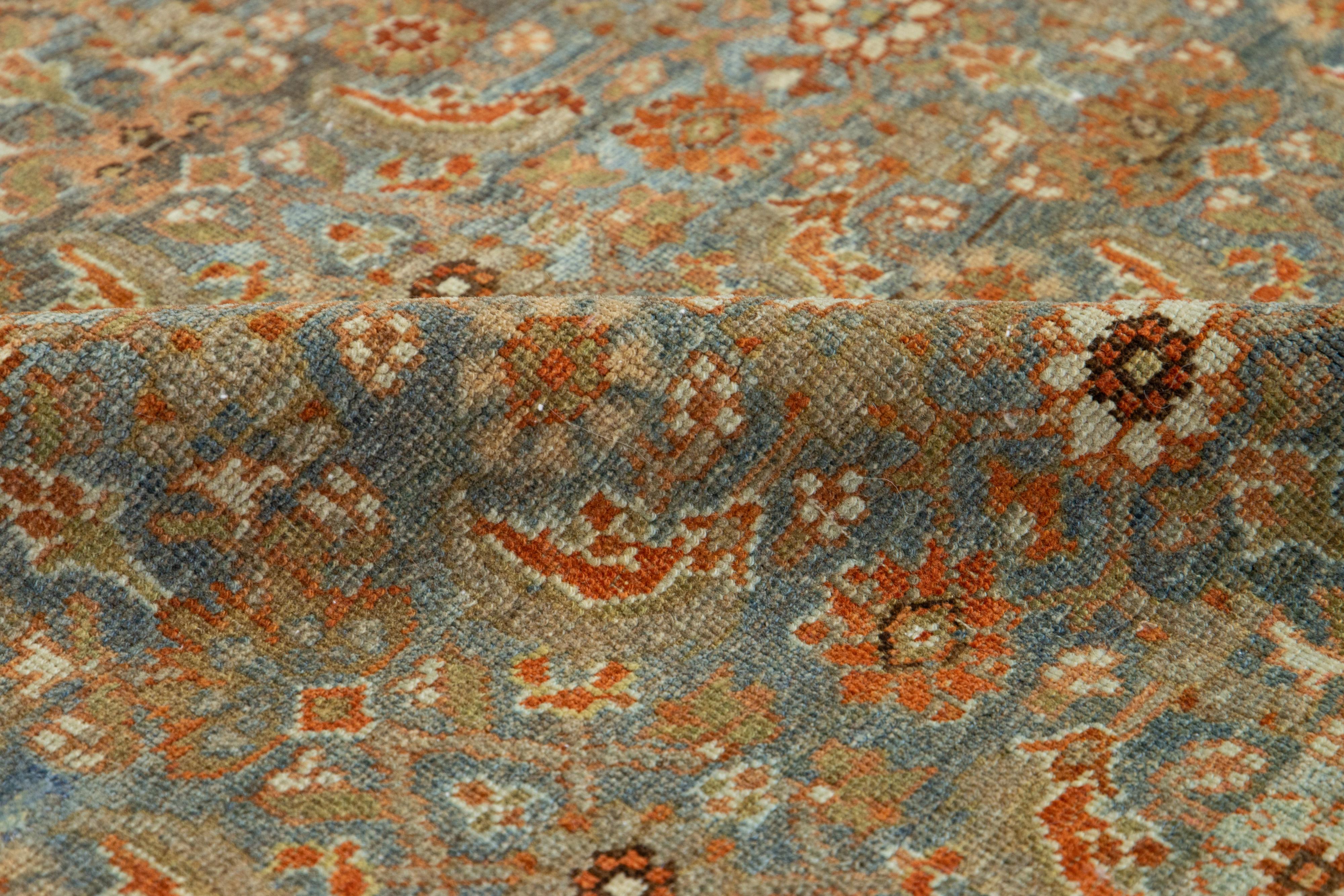 Persian Allover Floral Antique Malayer Wool Runner In Blue and Orange For Sale