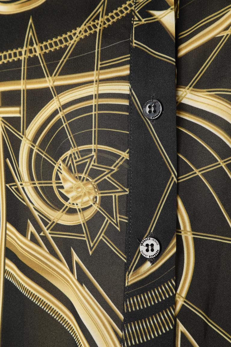 Noir Combinaison imprimée Allover avec chaîne à la taille Versace Jeans en vente