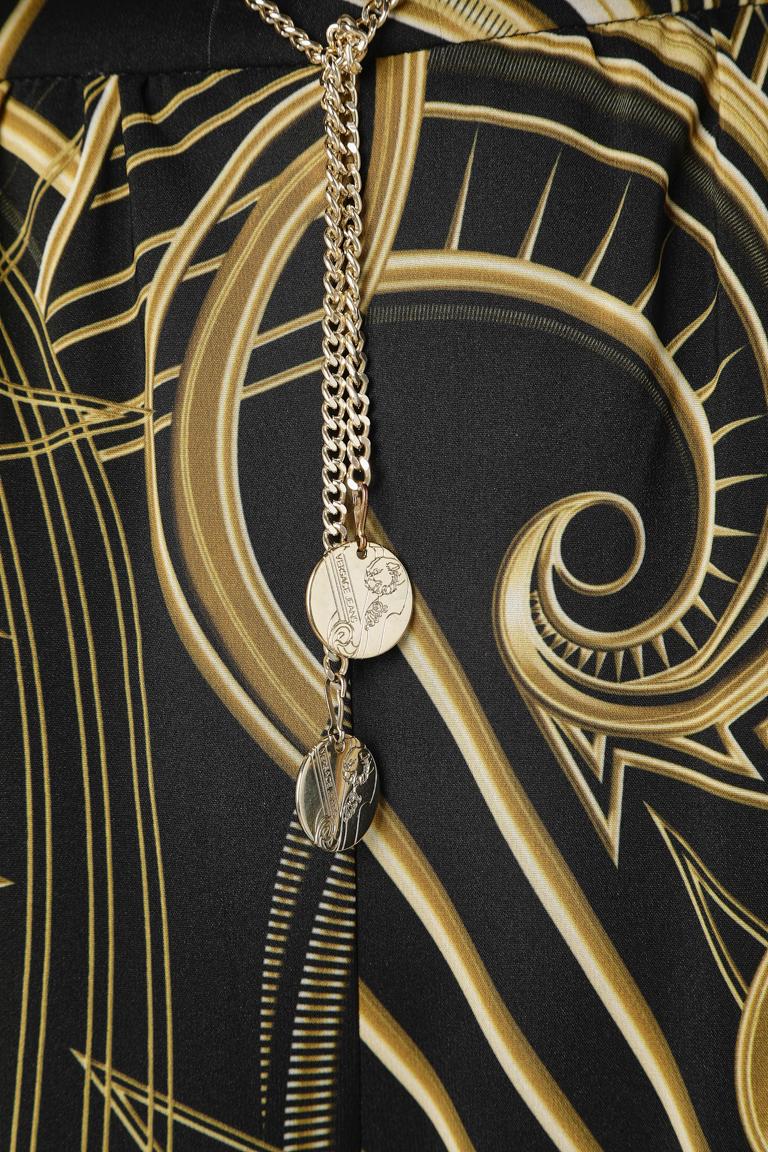 Combinaison imprimée Allover avec chaîne à la taille Versace Jeans Pour femmes en vente