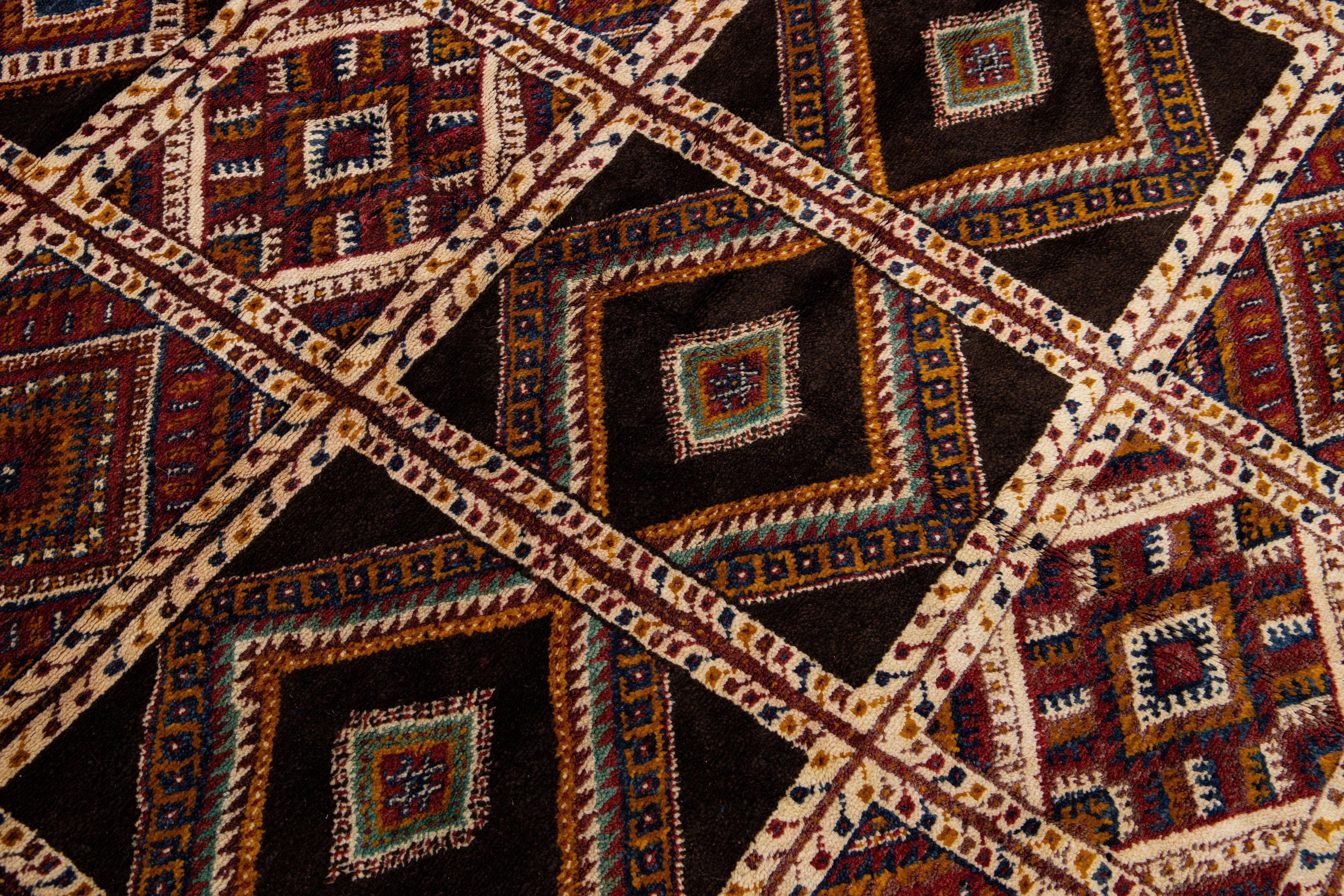 Mid-20th Century Allover Tribal Handmade Vintage Moroccan Wool Rug With Earthy Tones For Sale