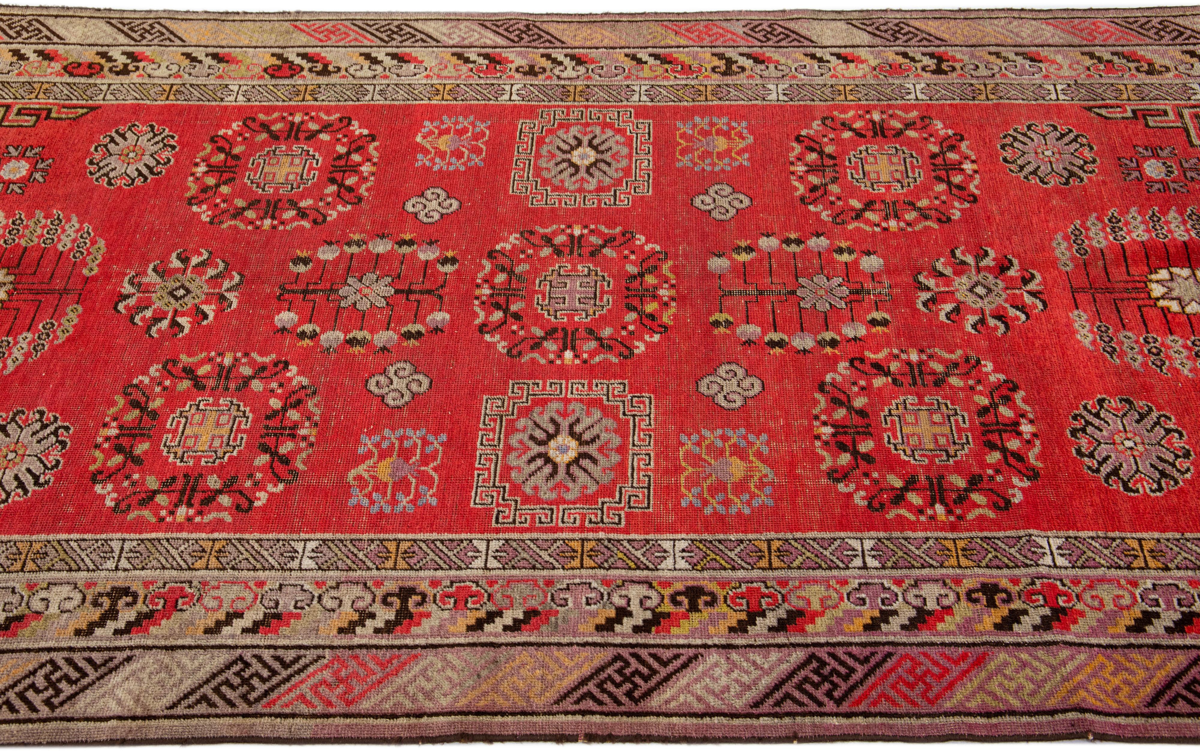 Hand-Knotted Allover Vintage Khotan Wool Rug Handmade in Red For Sale