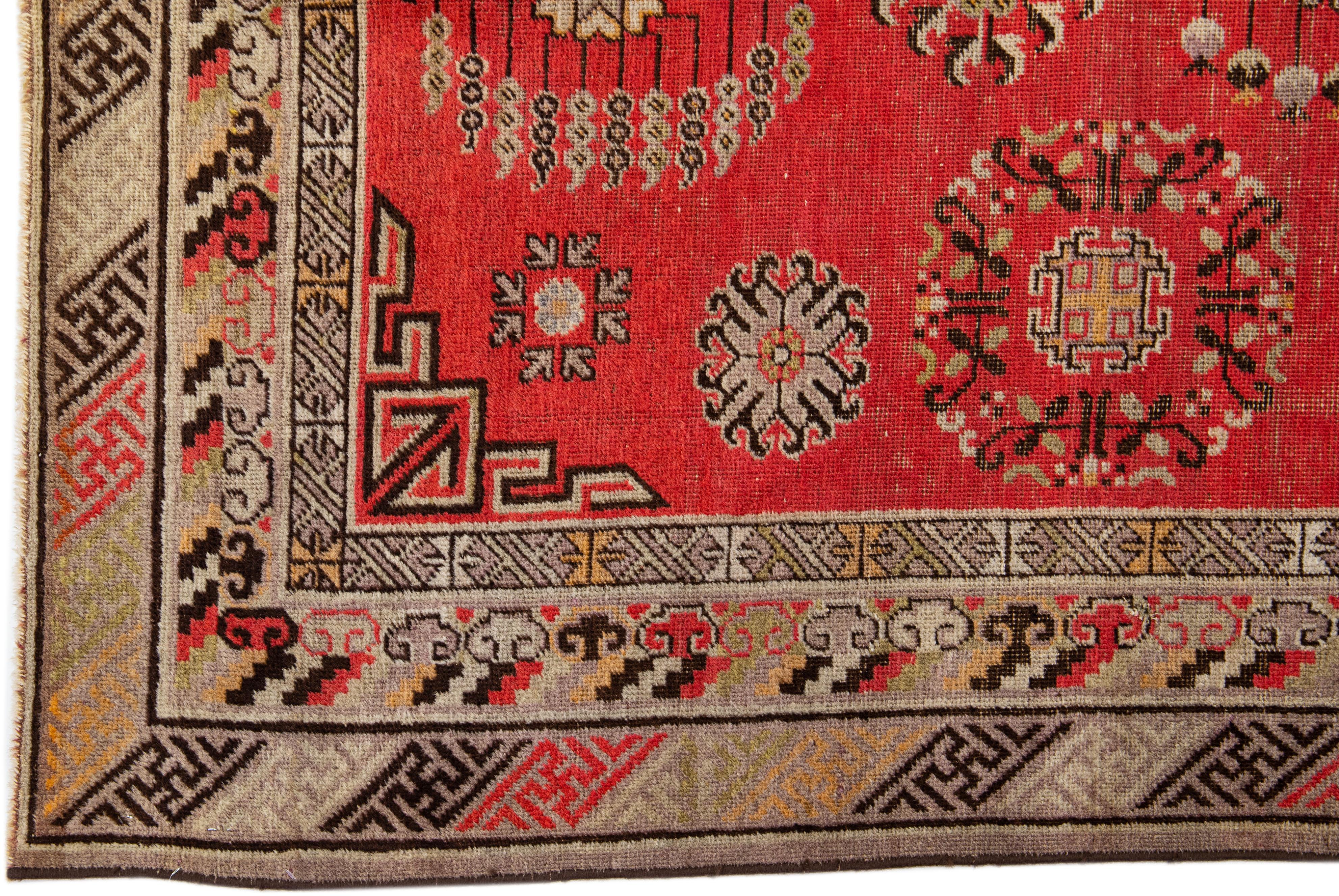 Allover Vintage Khotan Wool Rug Handmade in Red In Good Condition For Sale In Norwalk, CT