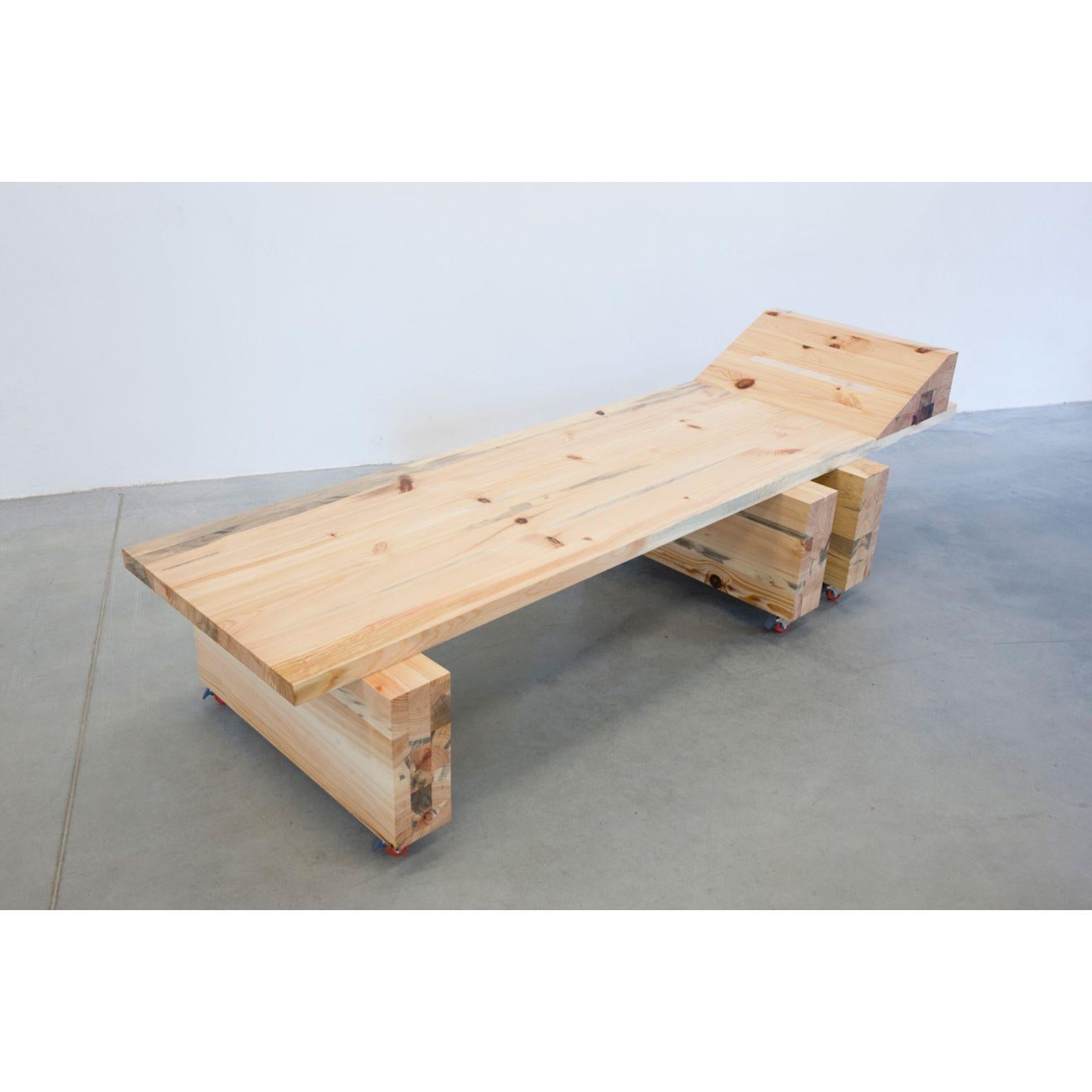 Allpine daybed by Radu Abraham
Materials: Pine wood
Dimensions: 230 x 70 x 35 cm

The result of a really nice process, this daybed is made entirely out of pine wood in a specific aesthetic language, with straight edge geometry and blocky