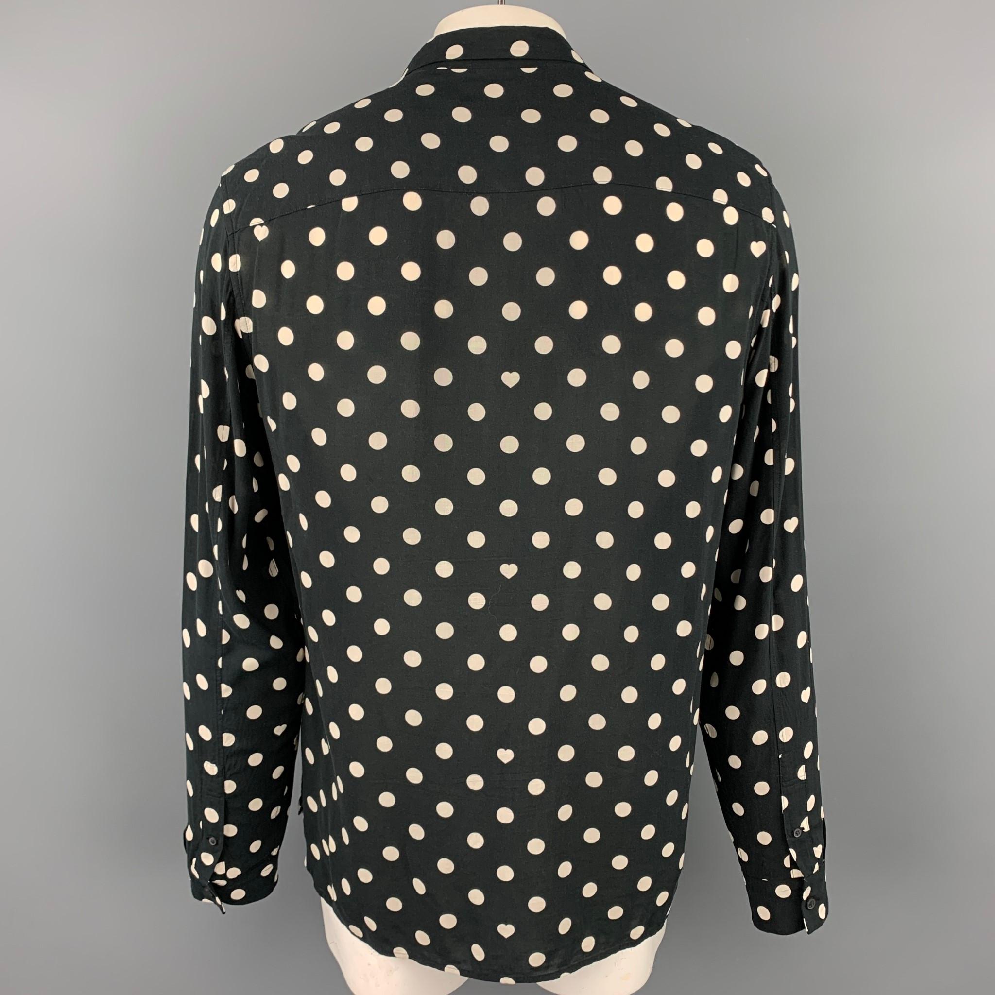 black and white polka dot shirt
