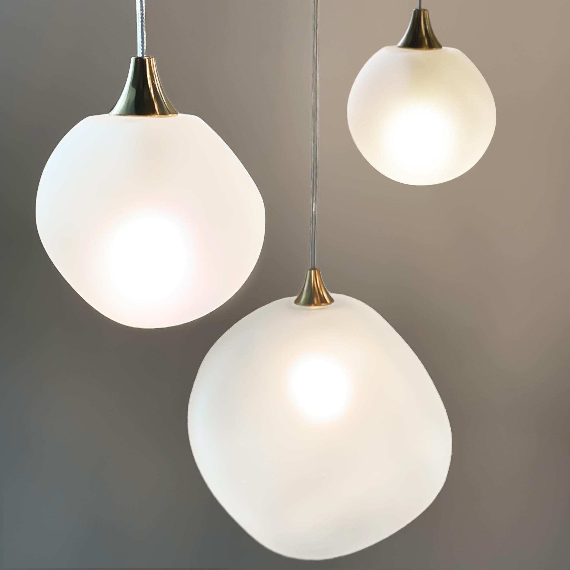 Glass Allure Chandelier Clear Globes and Frosted White Geometric hand-blown glass. LED For Sale