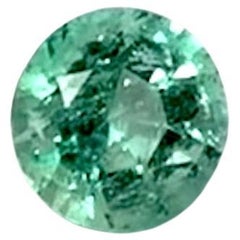 Alluring 0.65ct Round Cut Emerald, Radiant Green Brilliance for Sophisticated