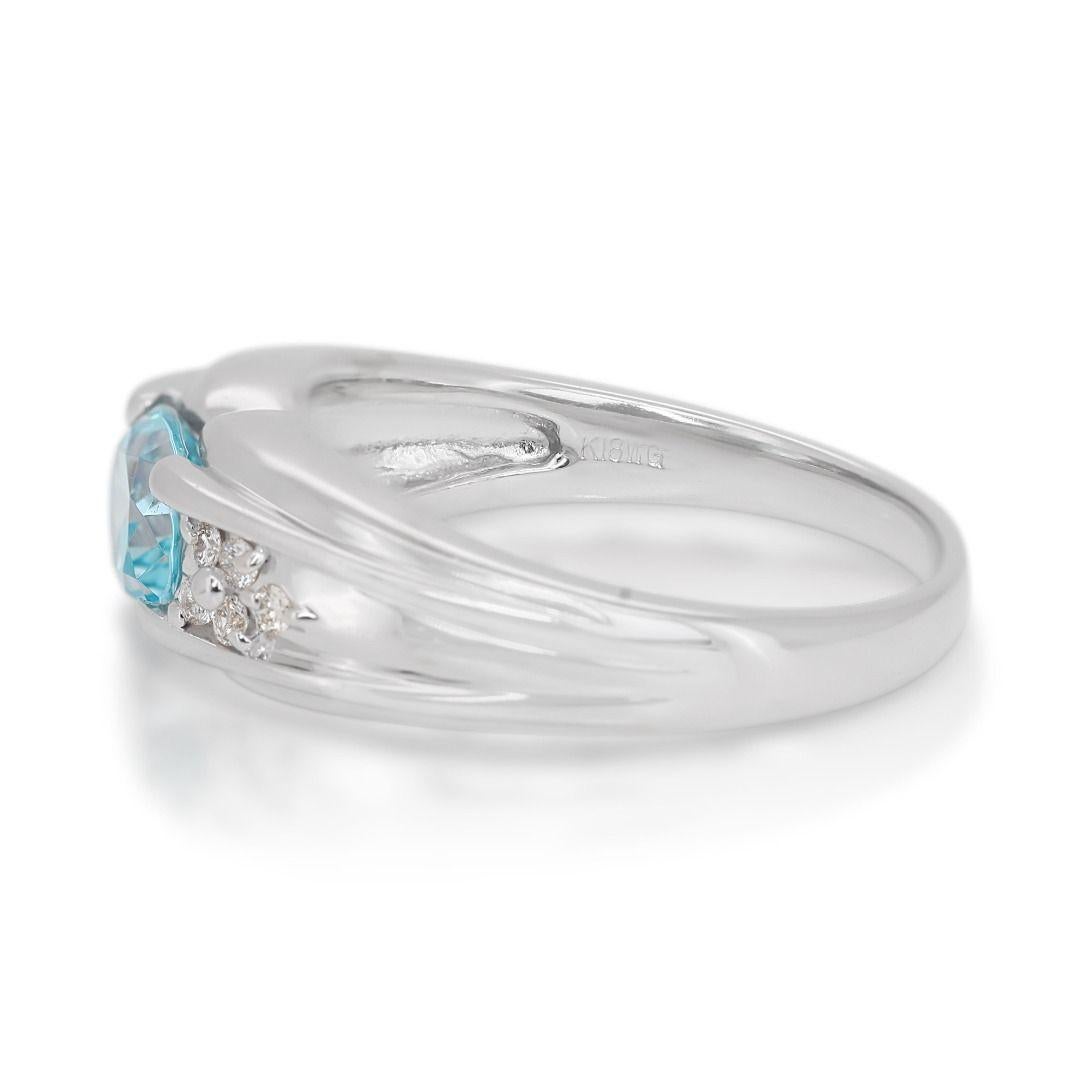 Alluring 0.96 Blue Topaz Ring with Side Diamonds in 18K White Gold For Sale 2