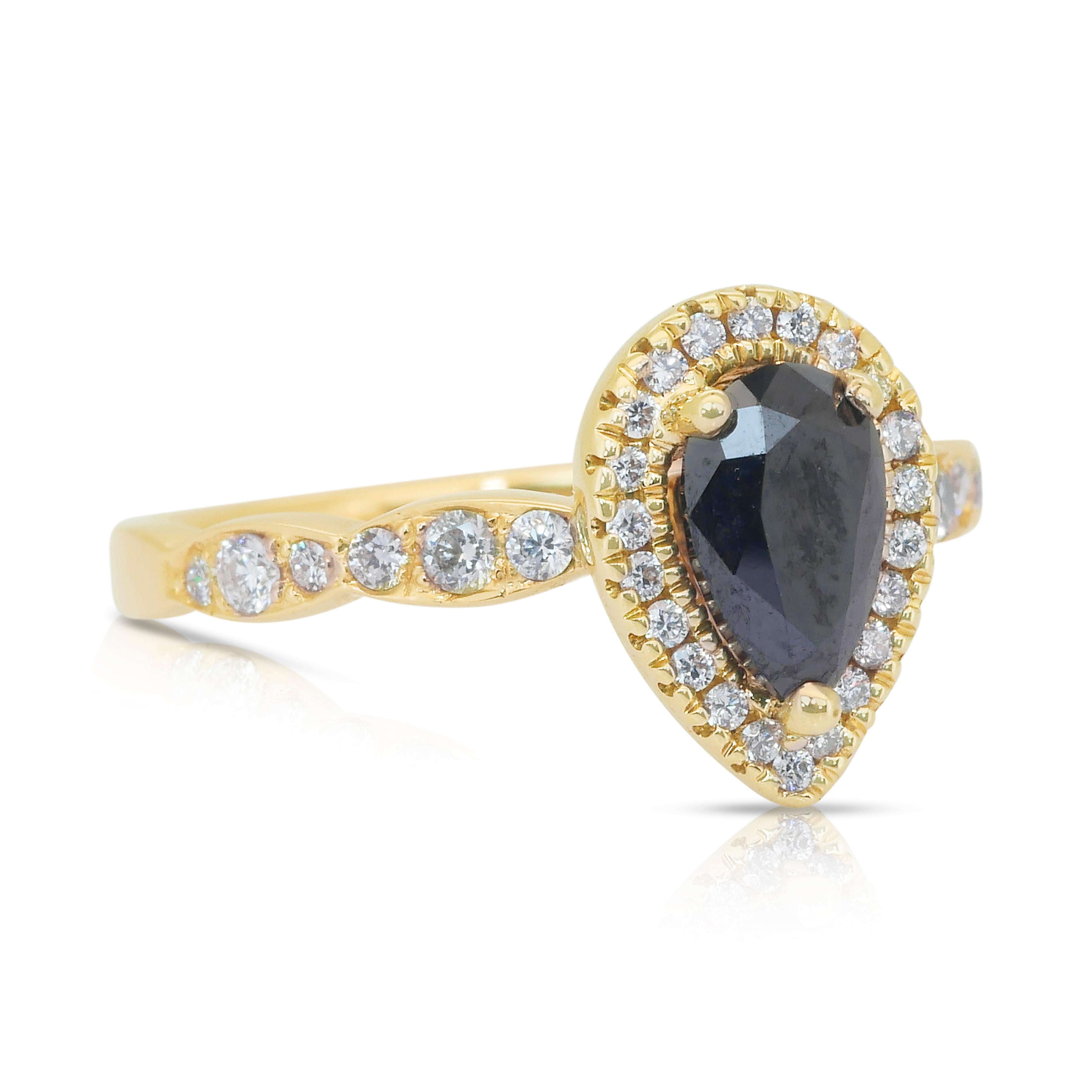 Superbe bague halo de diamants de 1,18 carat en or jaune 14 carats, certifiée IGI

Ce diamant poire de 0,75 carat, traité en noir, est un véritable symbole de mystère et de sophistication. Sertie dans un or jaune 14K chaleureux, la pièce centrale