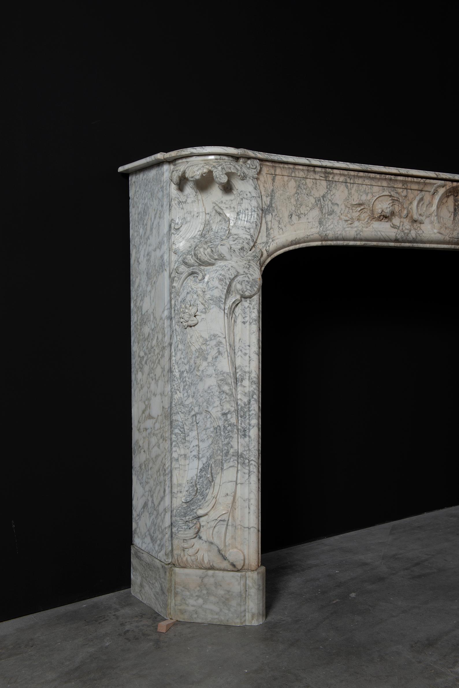 Carved Alluring 18th Century Dutch Louis XV Fireplace Mantel For Sale