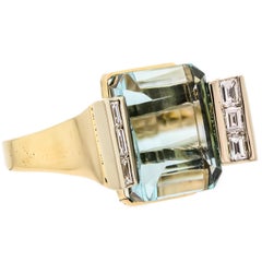 Alluring Aquamarine, Diamond and 14 Karat Yellow Gold Cocktail Ring