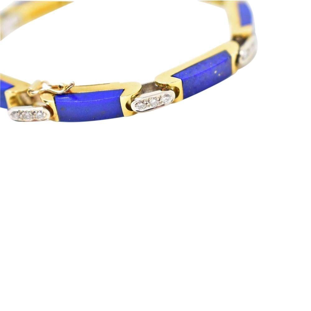 Tiffany & Co. Lapis Diamond Bracelet Circa 1970

8 Rectangular Polished Lapis Accented by 0.72 Carat Total Weight of Round Brilliant Diamonds (27)

18K Gold

Fully Signed 