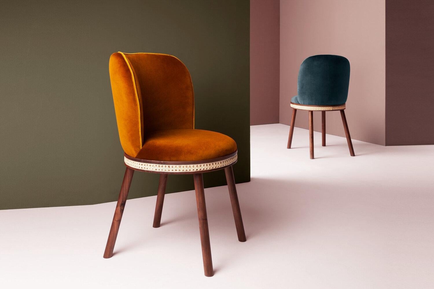 Alma velvet upholstered side chair. As any admirer would experience gazing at its muse, it is impossible not to feel enchanted and almost hypnotized by the refined, sensual lines and the delightfully charming soul of Alma chair. In a piece that