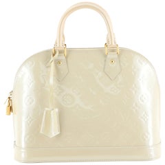 Alma Handbag Monogram Vernis PM