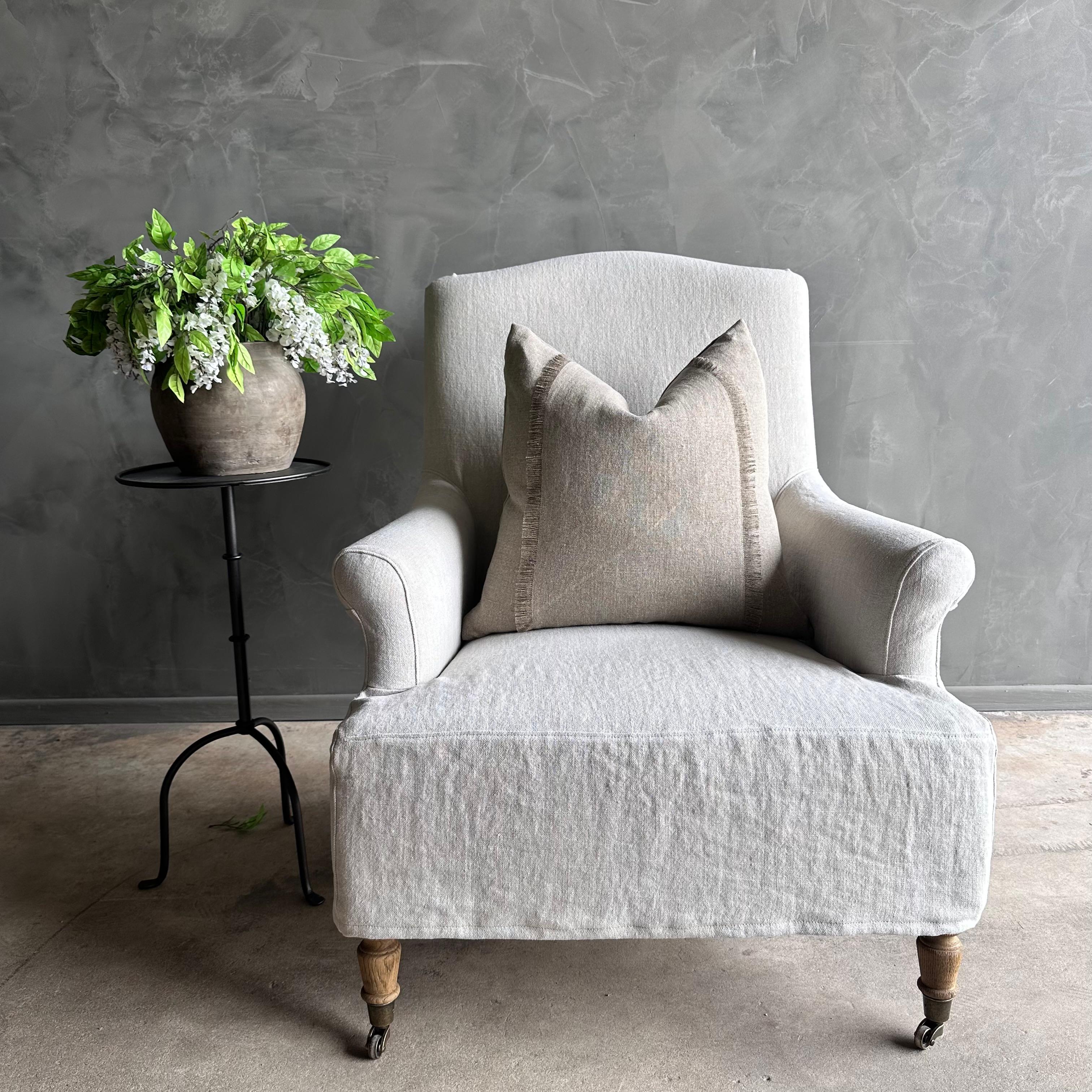 Introducing the Alma Accent Chair - a timeless piece crafted for comfort and style. Made with heavy-weight linen and slipcovered in a soothing oatmeal hue, this chair exudes a natural and relaxed elegance. The 18oz linen fabric offers a soft touch,