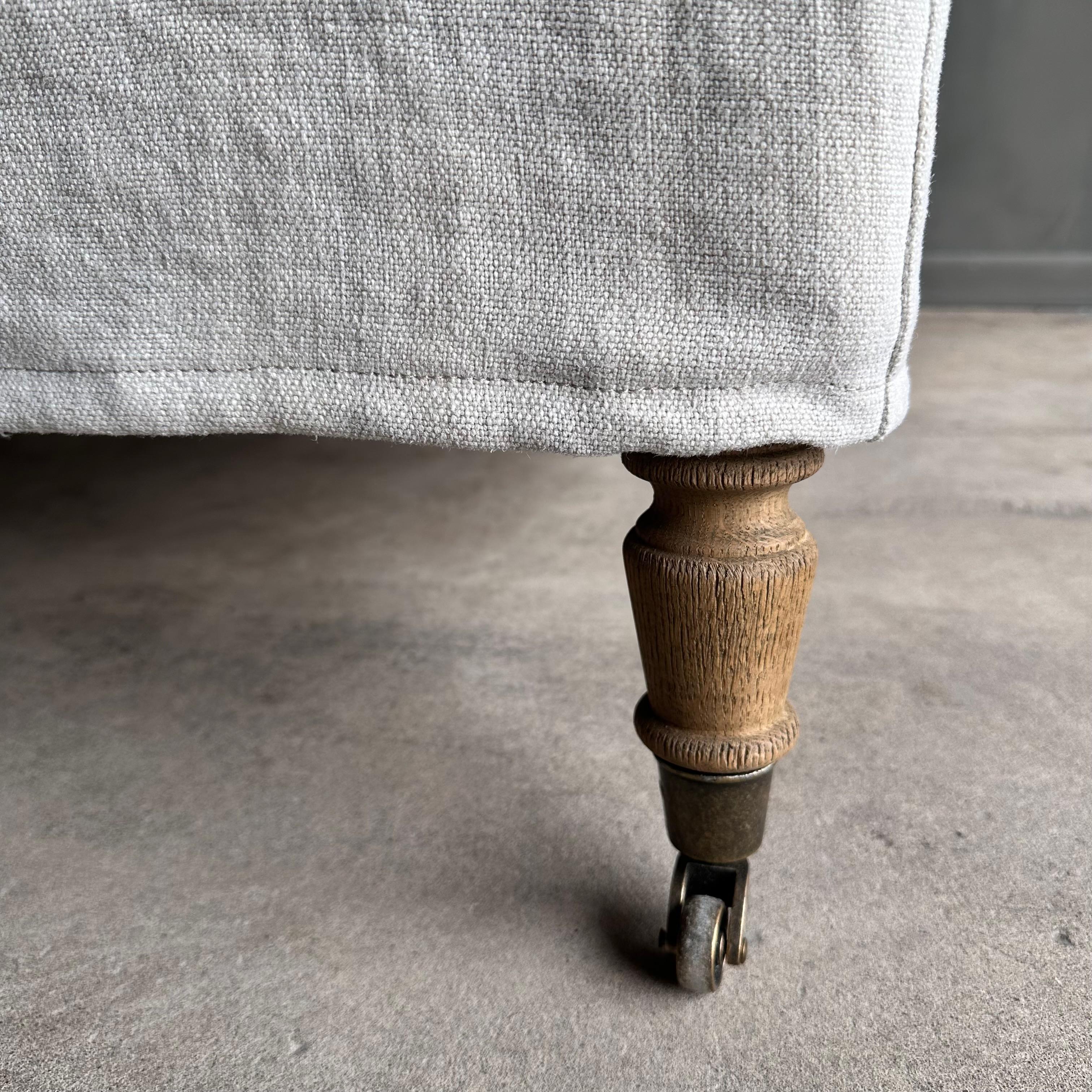 Brass Alma Linen Slip Covered Club Chair with White Oak Legs and Caster Wheels For Sale