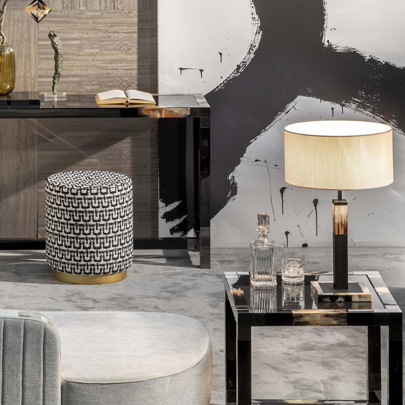 Alma Table Lamp by Arcahorn
Dimensions: D 40 x H 63 cm
Materials: Horn, leather, brass.

Table lamp in dark horn and Tosca leather (cat. Super), black colour. Gunmetal brass detailing. Lampshade in black shantung.

Colors and shades of horn