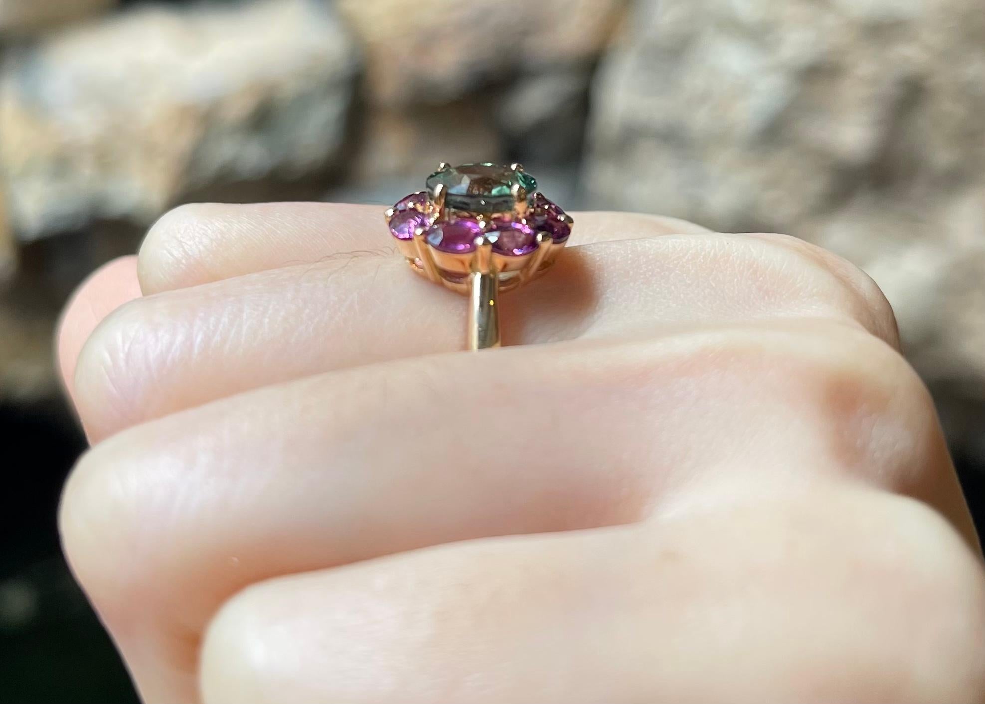 Almandite 1.85 carats and Demantoid 2.95 carats Ring set in 18K Rose Gold Settings

Width:  1.2 cm 
Length: 1.4 cm
Ring Size: 52
Total Weight: 6.89 grams

