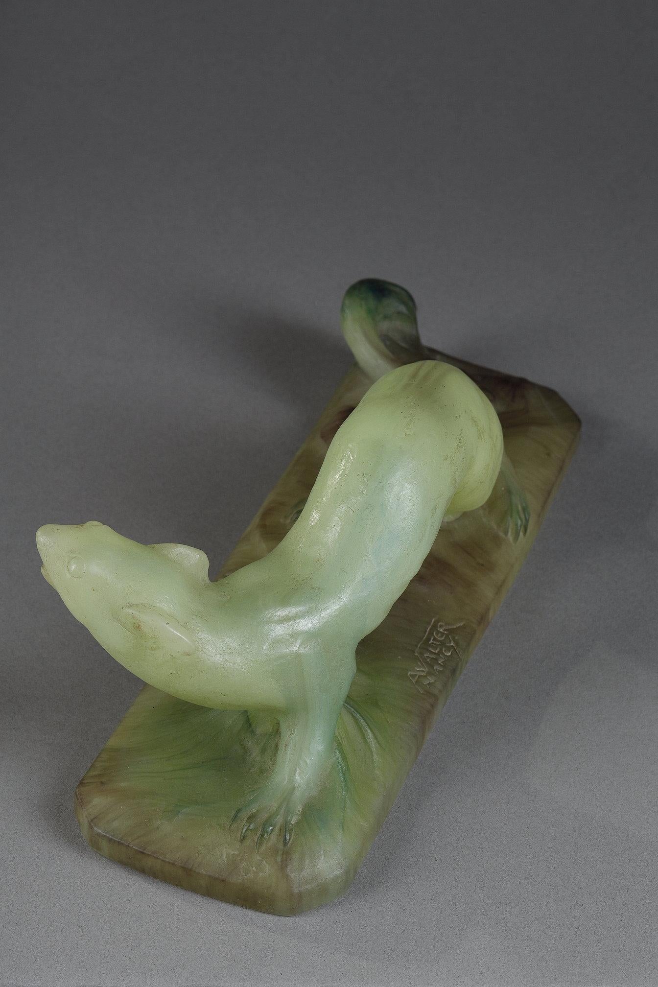 Ermine
by Almaric WALTER (1870-1959) 
 
Sculpture made in green and brown opaque glass paste
representing an ermine

signed on the base 