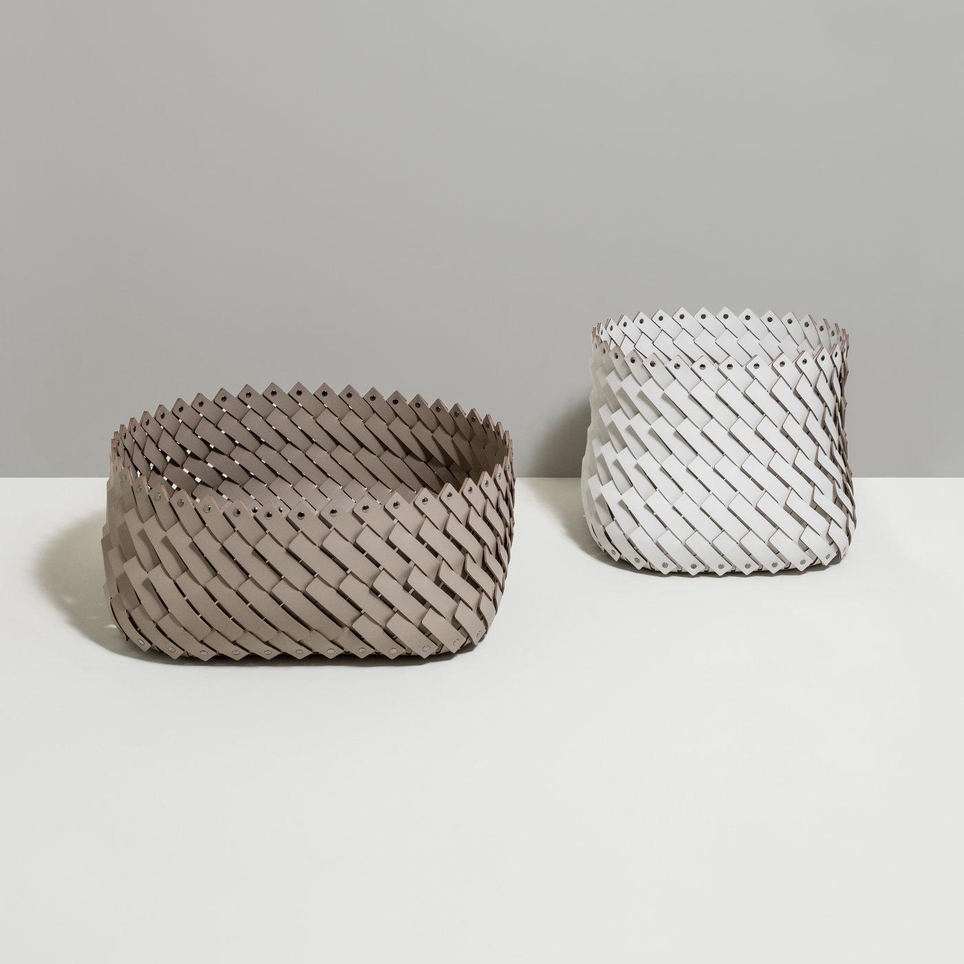 A stunning example of fine Italian craftsmanship, this basket from the Almeria Collection will fit elegantly in any interior, serving as a versatile accessory for everyday life needs. Handmade of eco-friendly, washable, and weather-resistant leather