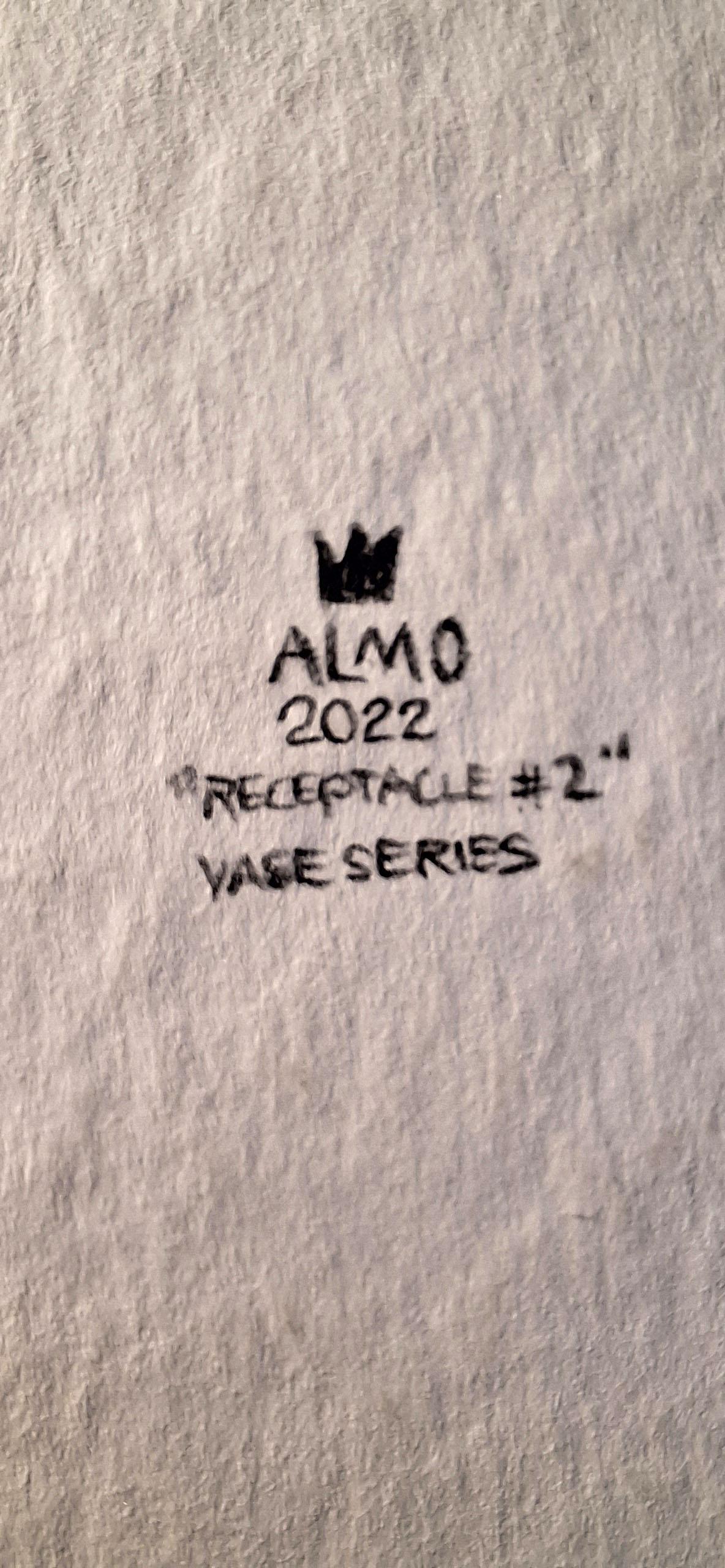 Almo wonders about his identity, the countries he has lived in, his daily routine and how he creates himself. An outsider who has made the world his home, skin, and citizenship, and through his artwork, he safeguards it in an attempt to explore the