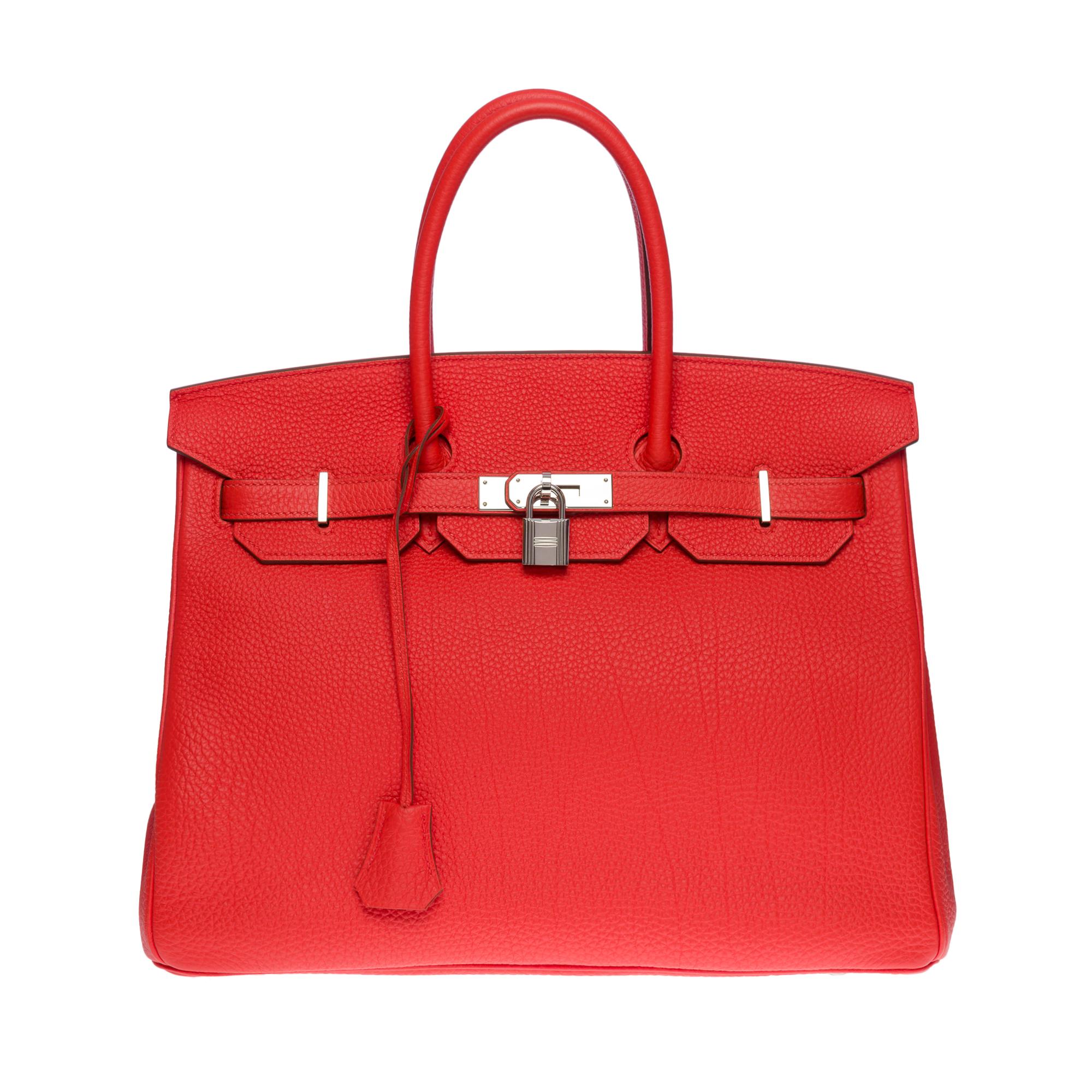 Beautiful and bright Hermes Birkin 35 handbag in Togo Orange Poppy leather, palladium silver metal hardware, double handle in orange leather allowing a hand carry

Flap closure
Orange leather lining, one zippered pocket, one patch pocket
Signature: