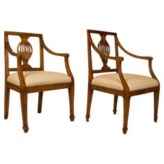 Almost Pair of Italian Neoclassic Arm Chairs, early 19th Century