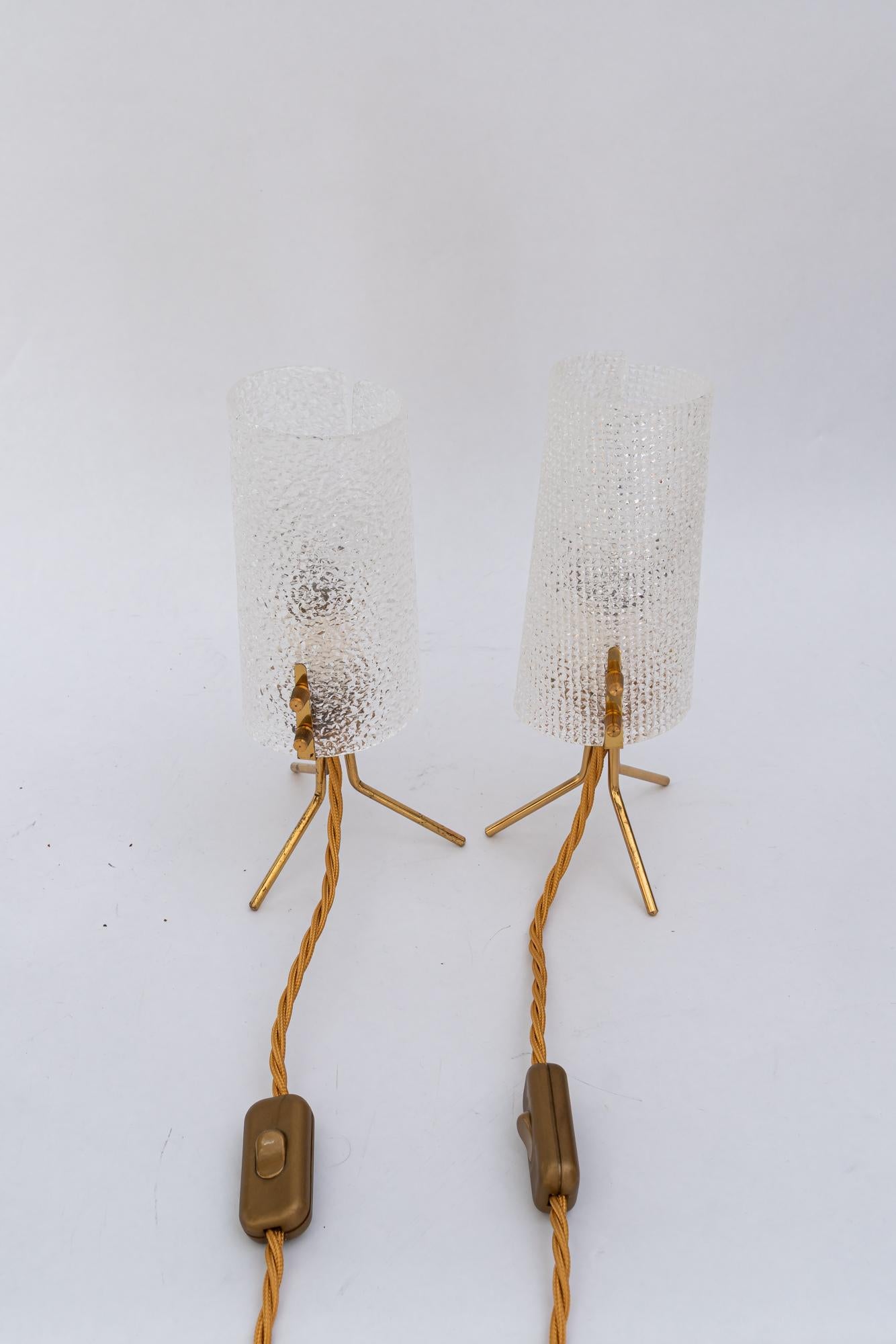 Almost same R. Nikoll table lamps with lucite shades vienna around 1950s
The shades are a little bit different.
The brass part is the same
Priced and sold per piece