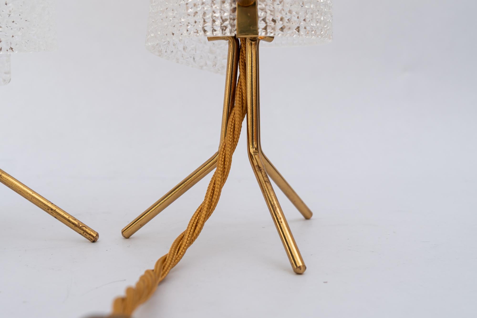 Brass Almost same R. Nikoll table lamps with lucite shades vienna around 1950s For Sale