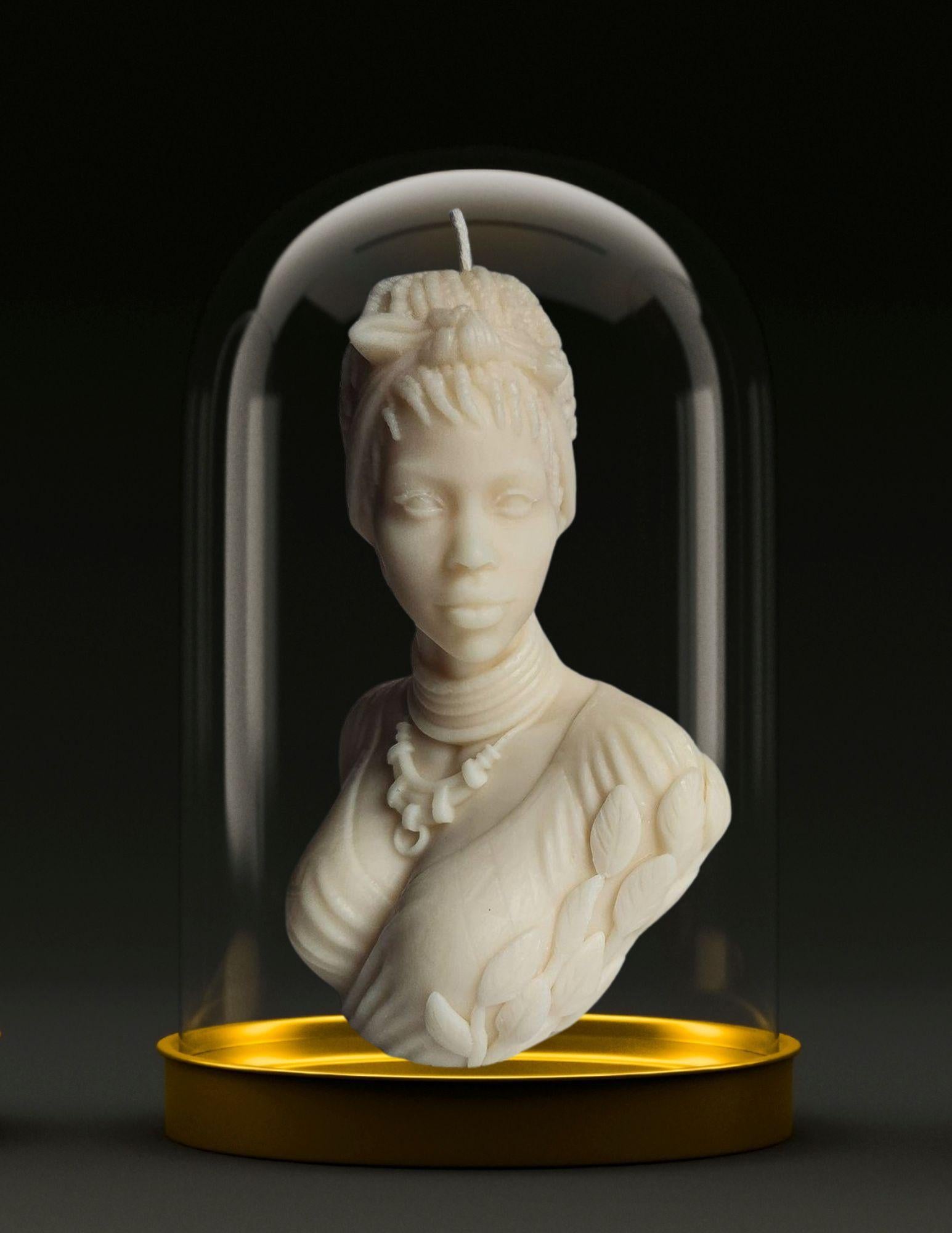 The Alodia Sculptural Candle is part of AphroChic's Les Nubians Collection, celebrating the cultural history and legacy of Africa’s kingdoms in late antiquity - a pivotal time for the establishment of the modern world. Named for the Nubian kingdom