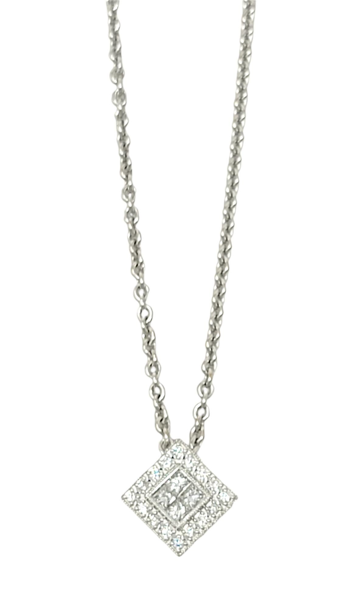 Simple yet elegant contemporary diamond halo pendant necklace is the perfect piece for everyday wear!

Metal: 18 Karat White Gold 
Natural Diamond: .58 carats
Diamond cut: Princess and Round
Diamond color: F-G
Diamond clarity: VVS2-VS1
Pendant