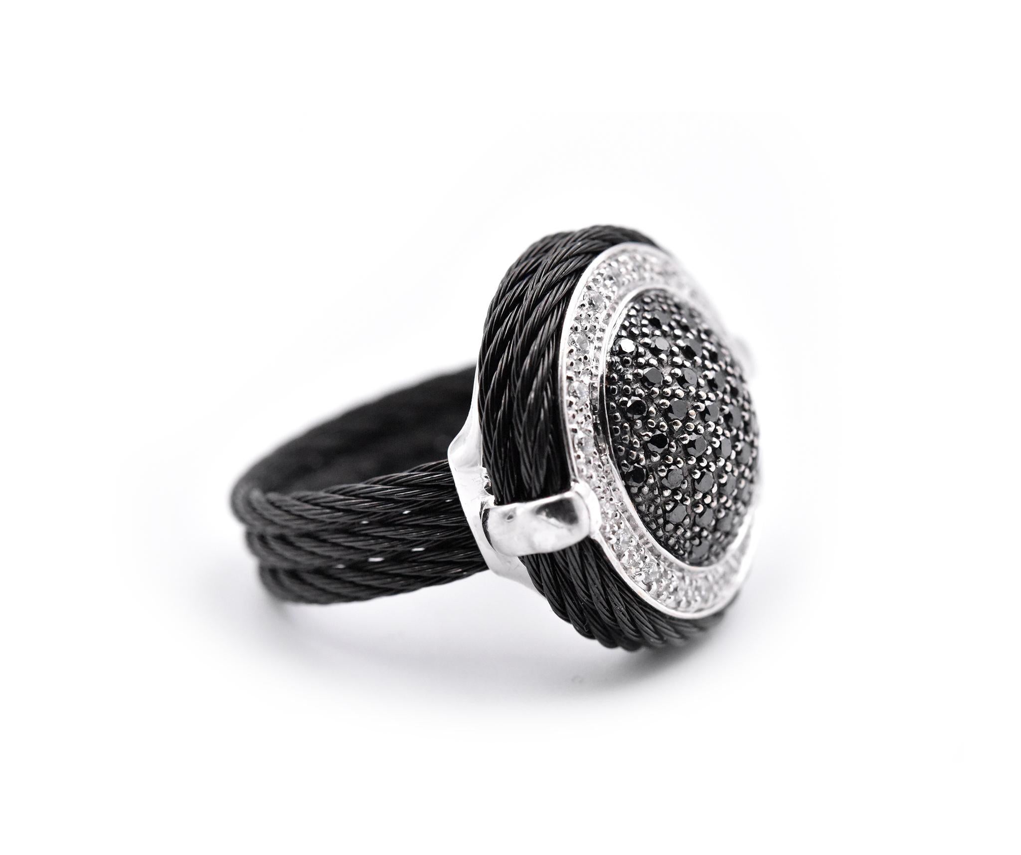 Designer: Alor Noir
Material: 18k white gold and stainless steel
White Diamonds: 18 round brilliant cuts = 0.16cttw
Black Diamonds: 43 round brilliant cuts = 0.42cttw
Ring Size: 7 ¼ (ring cannot be sized)
Dimensions: ring top measures 22mm in
