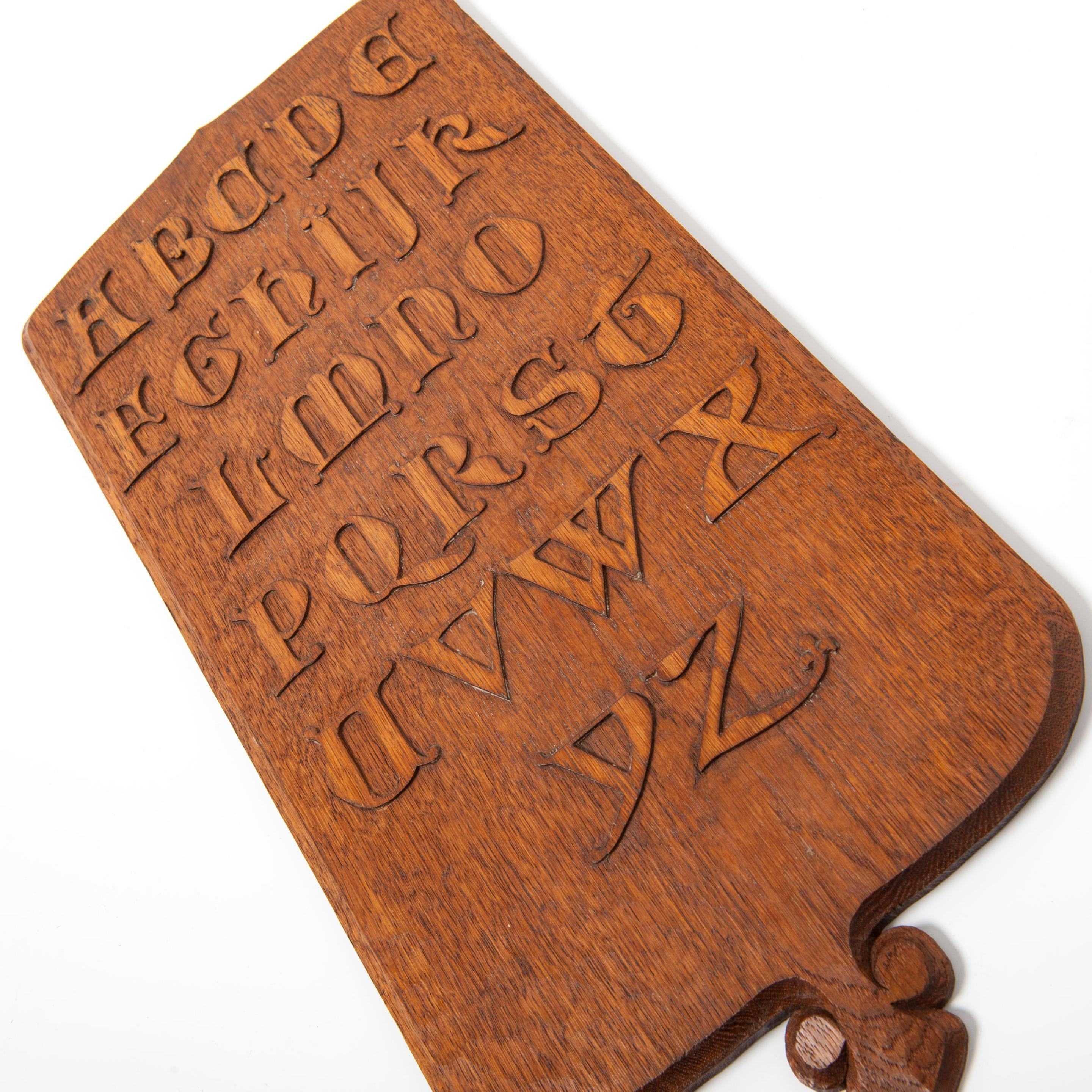 Ref: 125292
Carved oak alphabet spelling board - a school teaching aid
England circa 1880
Measurements: H: 52cm (20.5