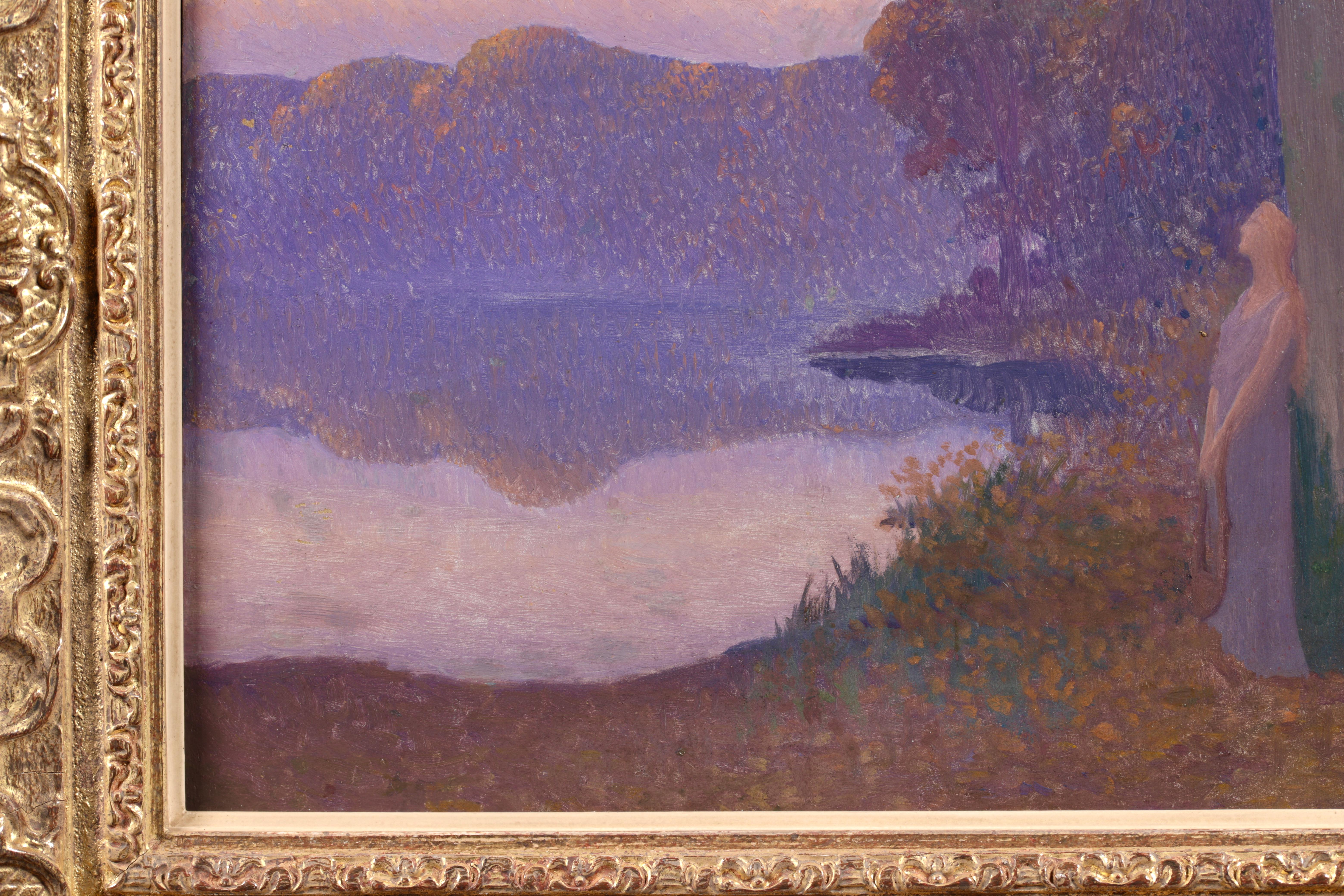Signed and dated symbolist figure in landscape oil on board by French painter Alphonse Osbert. The piece depicts a blonde woman in a full length purple dress holding a leather satchel and leaning against the moss-covered trunk of a tree. She is