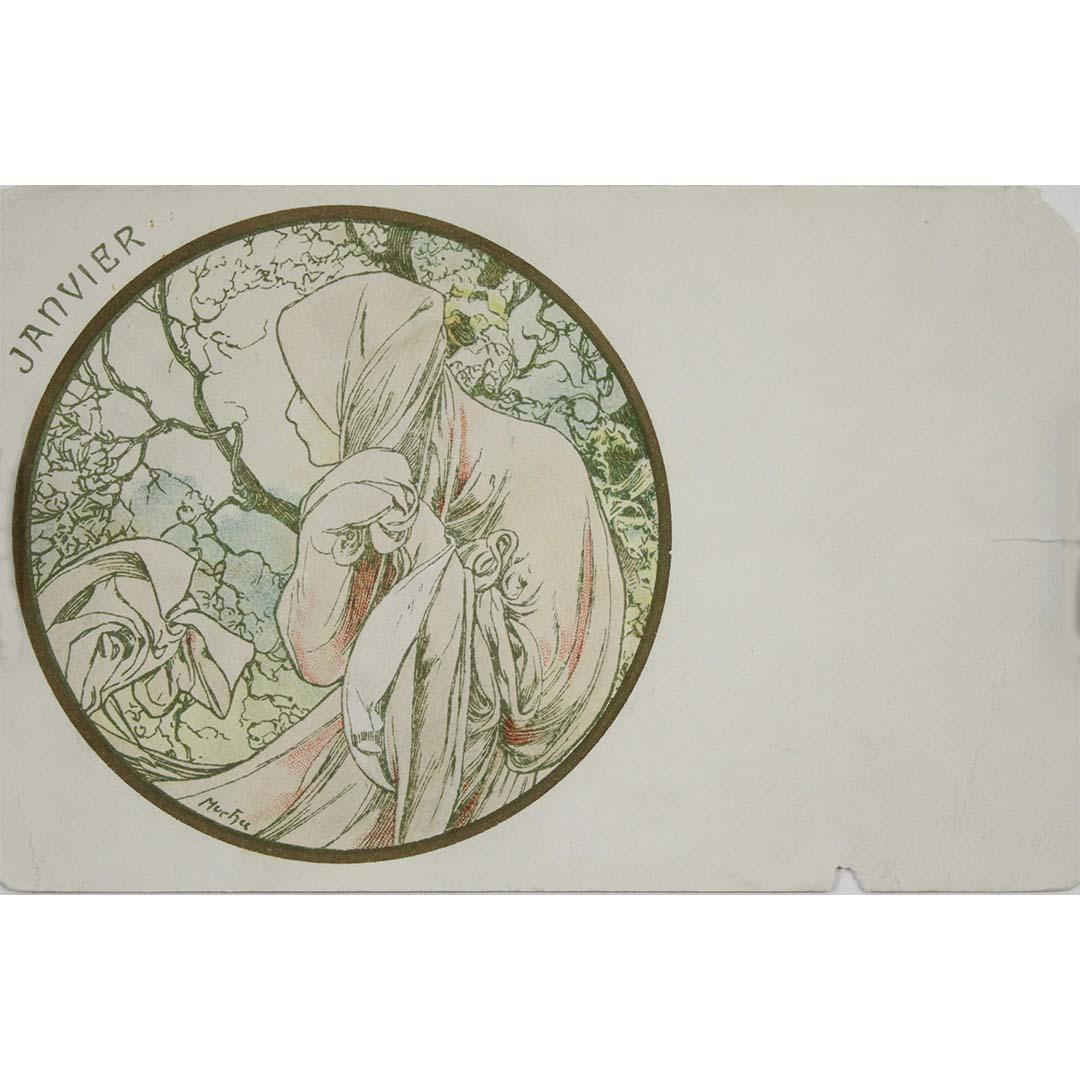 This exquisite Art Nouveau postcard, created around 1900 by Alphonse Mucha, features the month of January (Janvier) in a poetic and dreamlike composition. Mucha, renowned for his elegant and flowing designs, captures the spirit of the winter season
