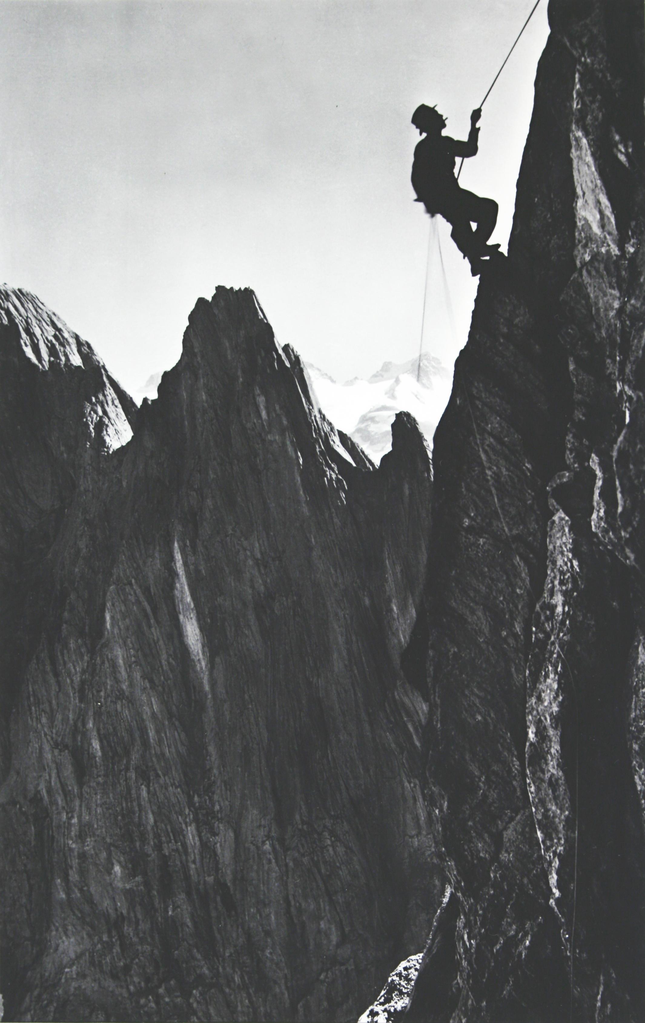 Vintage Alpine Mountaineering photograph.
'CLIMBER' Simelistock, Switzerland, a new mounted black and white photographic image after an original 1930s mountaineering photograph.

Engelhoerner is the name for a group of limestone mountains that