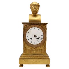 Collezione Alriz: Un orologio dell'impero con busto di Homer in ormolu alla maniera di Thomire