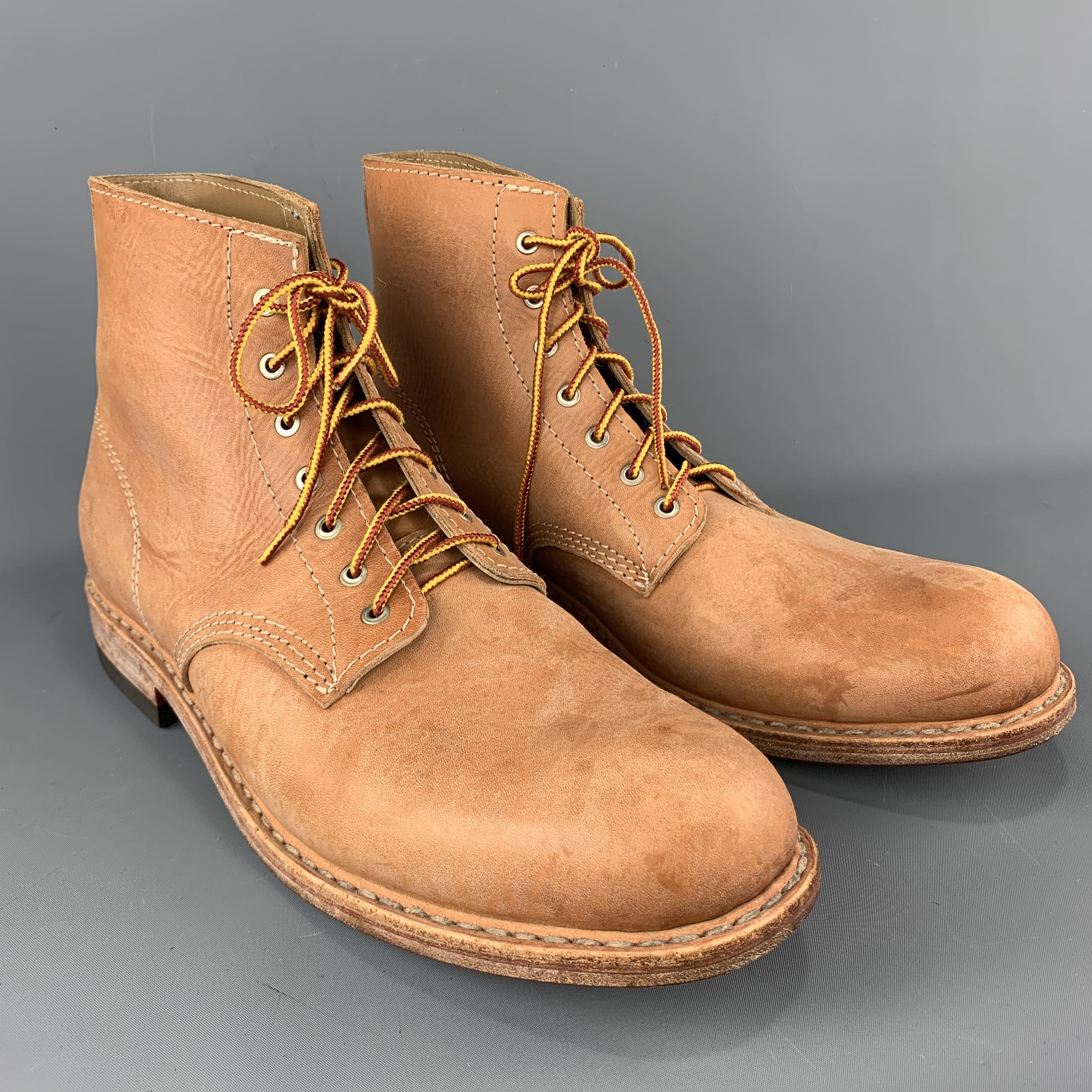 Handmade AL'S ATTIRE of San Francisco California work boots come in tan leather with a lace up front and tonal sole with rubber end heel. Made in USA.

Excellent Pre-Owned Condition.
Marked: 12

Outsole: 13 x 4.75 in.