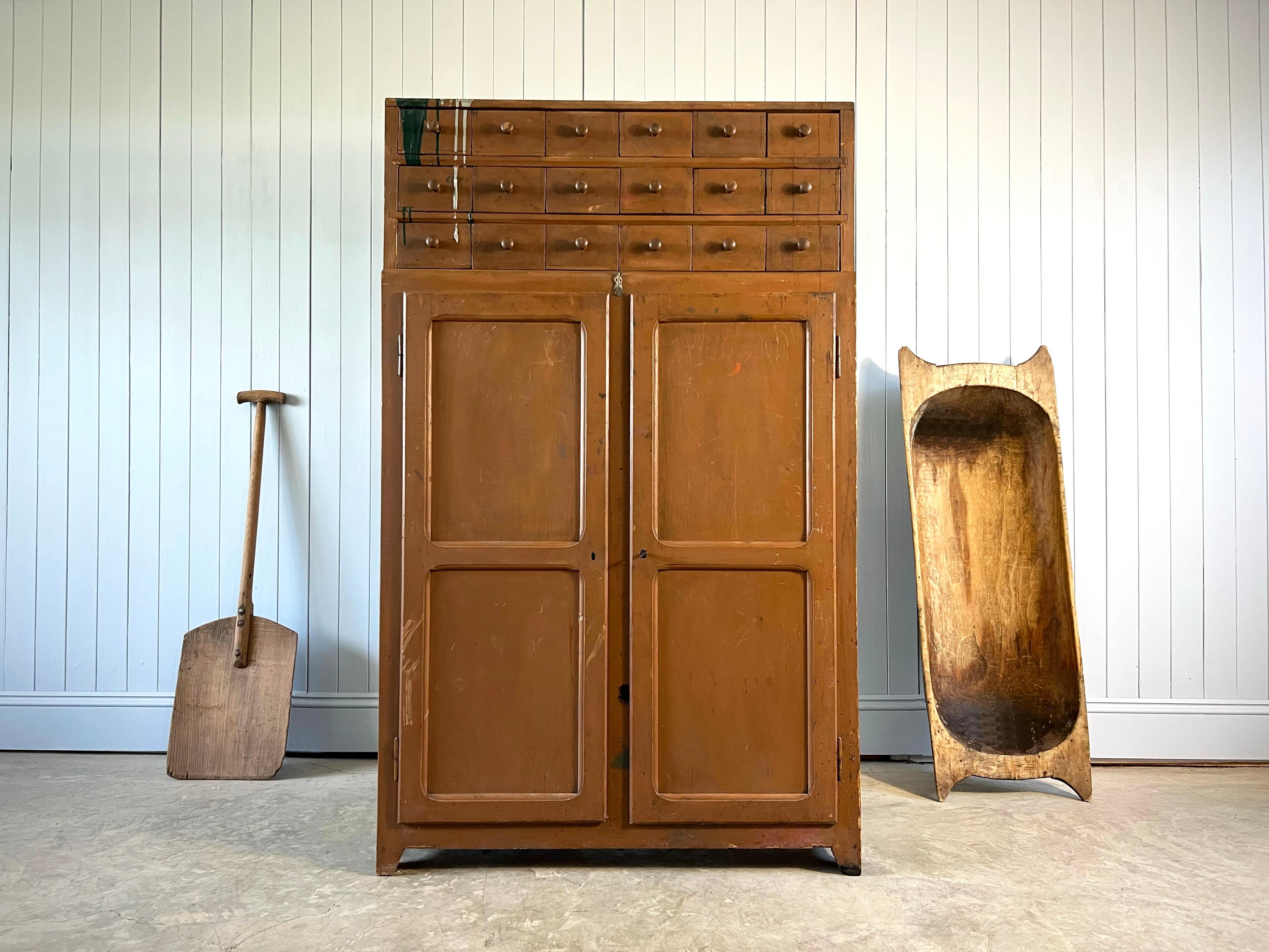 This industrial cupboard is early 20th century from the Alsace region of France.  We know this because of the little lead figure nailed to the front which is typical of the region.

Lovely to have some industrial pieces in stock.  We have kept this