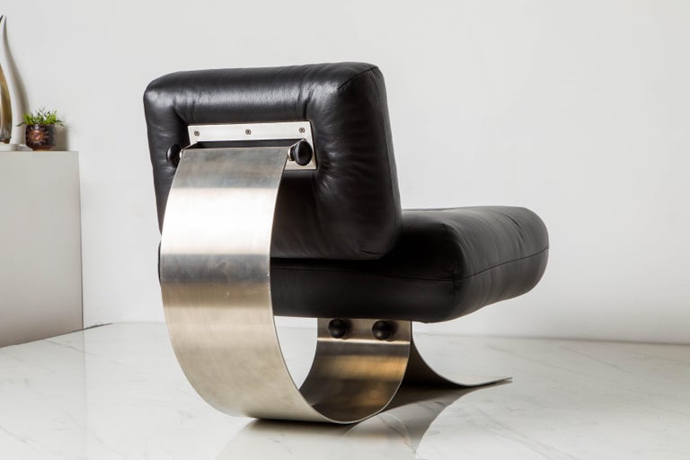 Stainless Steel 'Alta' Lounge Chair & Ottoman by Oscar Niemeyer for Mobilier Intl, 1970s, Signed For Sale