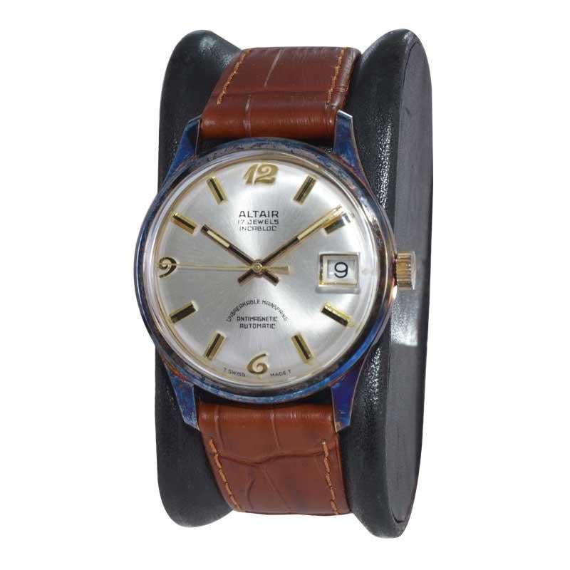 FACTORY / HOUSE: Altair Watch Company
STYLE / REFERENCE: Mid Century Modern / Round 
METAL / MATERIAL: Yellow Gold Filled / Oxidized From Age
CIRCA / YEAR: 1960's
DIMENSIONS / SIZE: Length 41mm x Diameter 34mm
MOVEMENT / CALIBER: Automatic Winding /