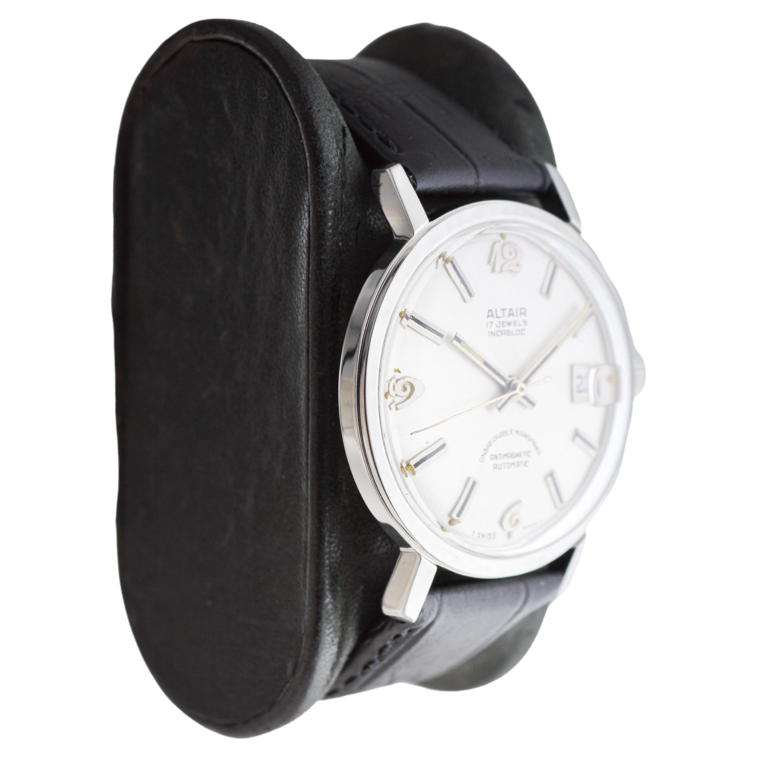 FACTORY / HOUSE: Altair Watch Company
STYLE / REFERENCE: Round Dress Style 
METAL / MATERIAL: Stainless Steel
CIRCA / YEAR: 1950's / 60's
DIMENSIONS / SIZE: Length 42mm X Diameter 35mm
MOVEMENT / CALIBER: Automatic Winding / 17 Jewels 
DIAL / HANDS: