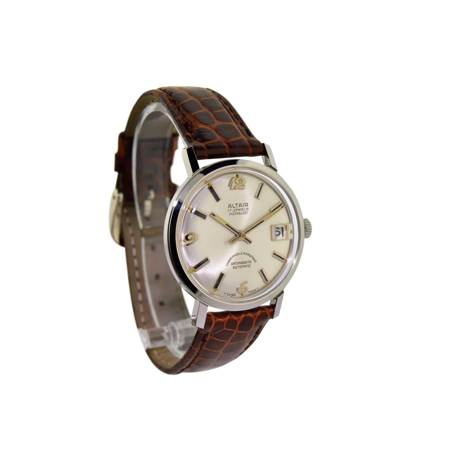 FACTORY / HOUSE: Altair Watch Company
STYLE / REFERENCE: Classic Round 
METAL / MATERIAL: Steel 
CIRCA: 1950's / 1960's
DIMENSIONS: 41mm X 34mm
MOVEMENT / CALIBER: Automatic Winding / 17 Jewels 
DIAL / HANDS: Original Silvered with Baton Markers /