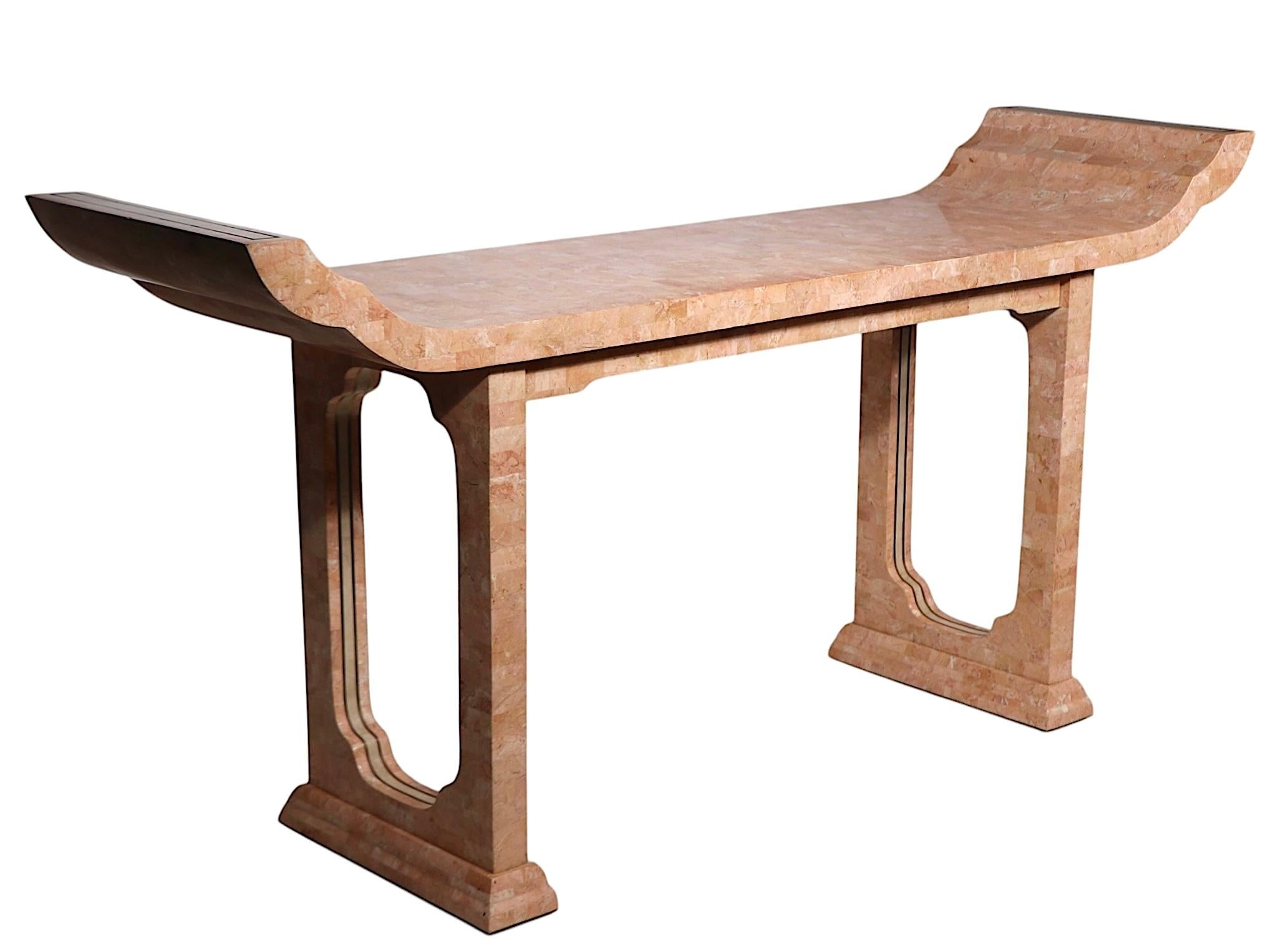 Chic Asian influence postmodernist take on a classical Qing form alter table, made by Maitland Smith c. 1970's. The table is executed in tessellated stone and brass, it is in very fine, original, clean and ready to use condition showing only light