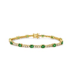 Alternate Diamond & Oval Emerald Tennis Bracelet (4.45 ct.) 4-Prongs 14K Gold