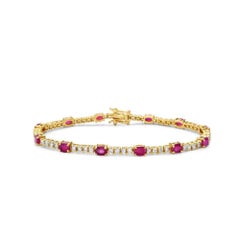 Alternate Diamond & Oval Ruby Tennis Bracelet (5.45 ct.) 4-Prongs Setting in 14K