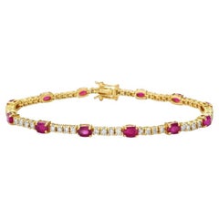 Alternate Diamond 
Oval Ruby Tennis Bracelet (5.45 ct.) 4-Prongs Setting in 14K