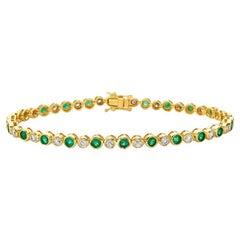 Tennisarmband mit abwechselnd Diamanten und Smaragden (4,00ct.) Lünette in 14K Gold gefasst